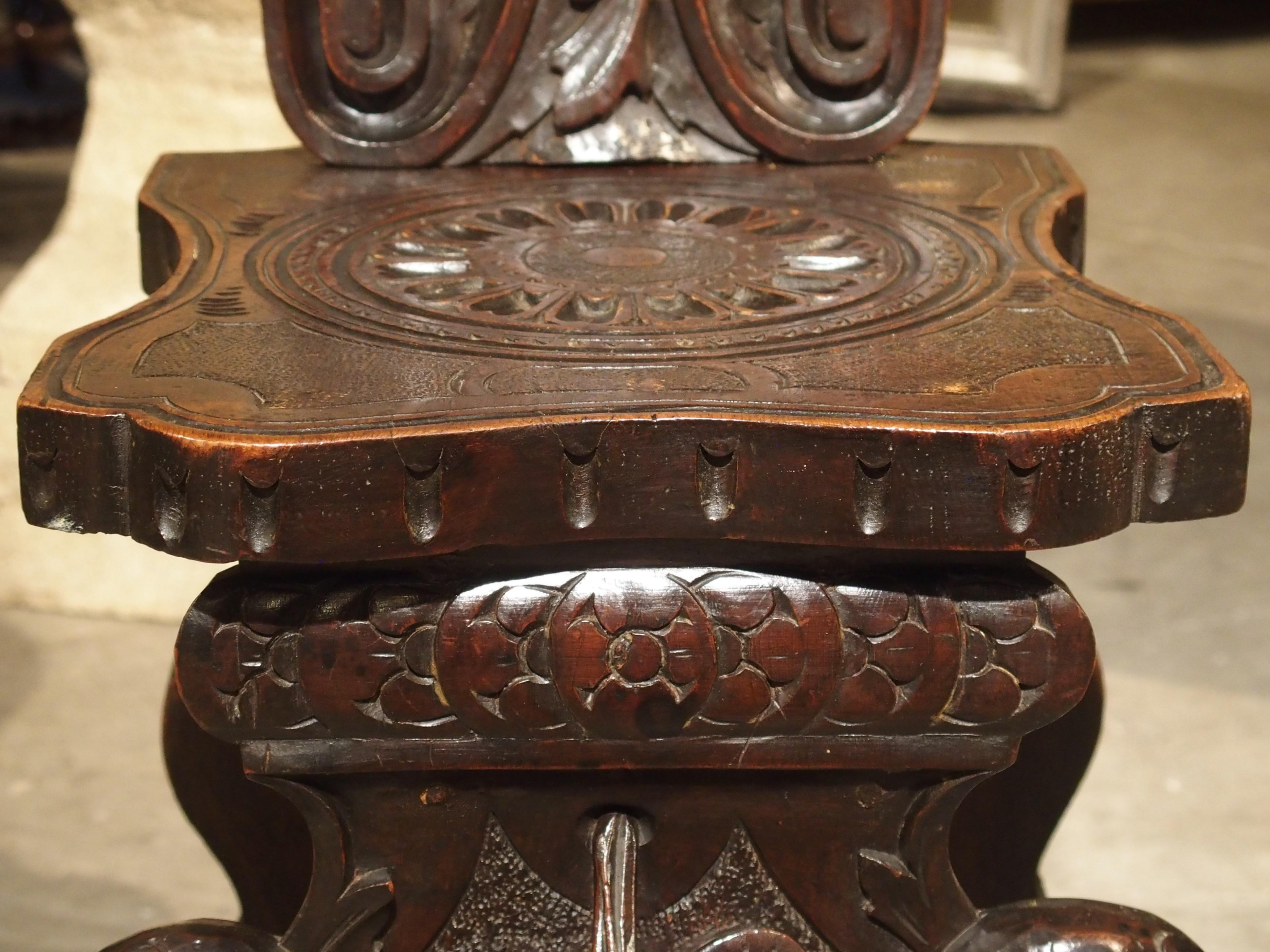 Richly Carved 19th Century Escabelle Chair from Switzerland 7