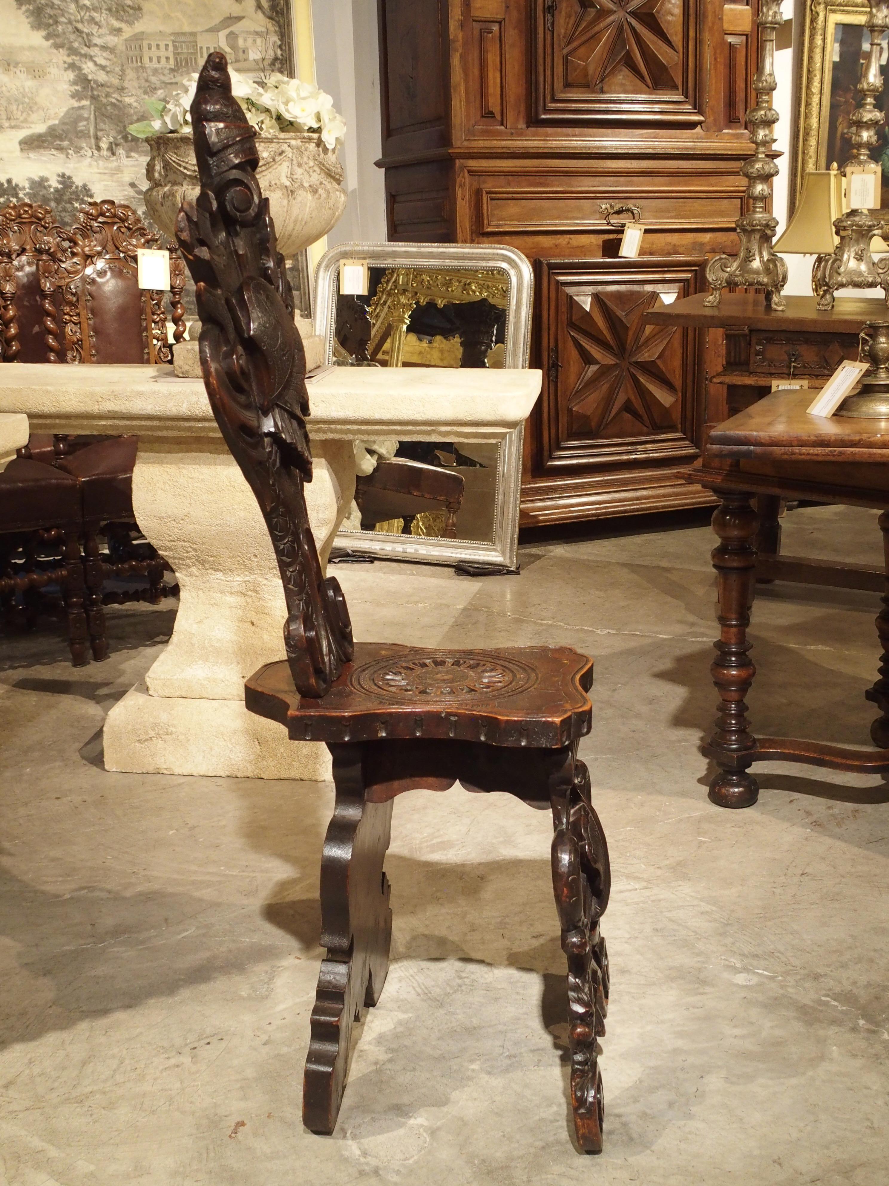 Richly Carved 19th Century Escabelle Chair from Switzerland 8