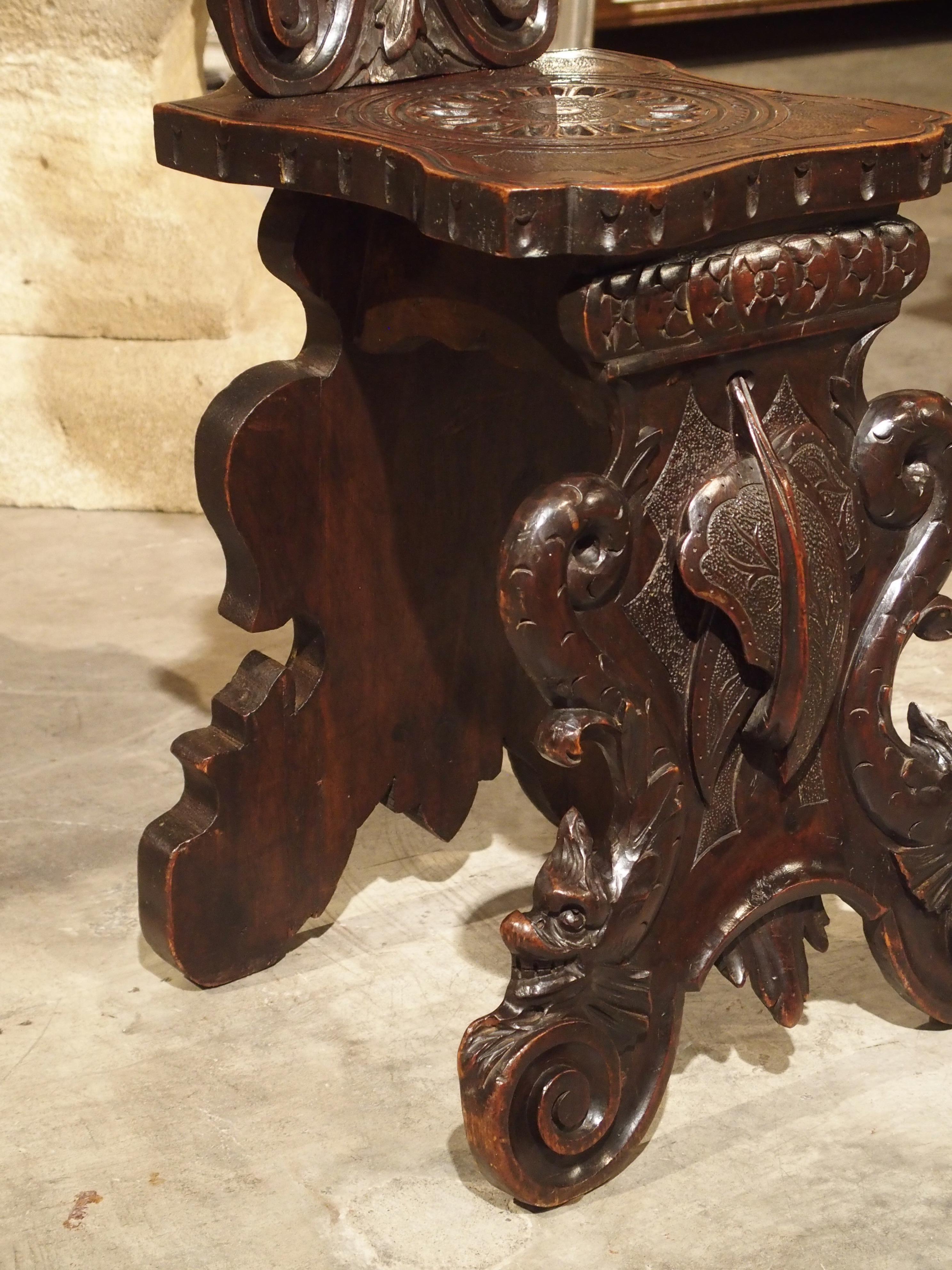 Hand-Carved Richly Carved 19th Century Escabelle Chair from Switzerland