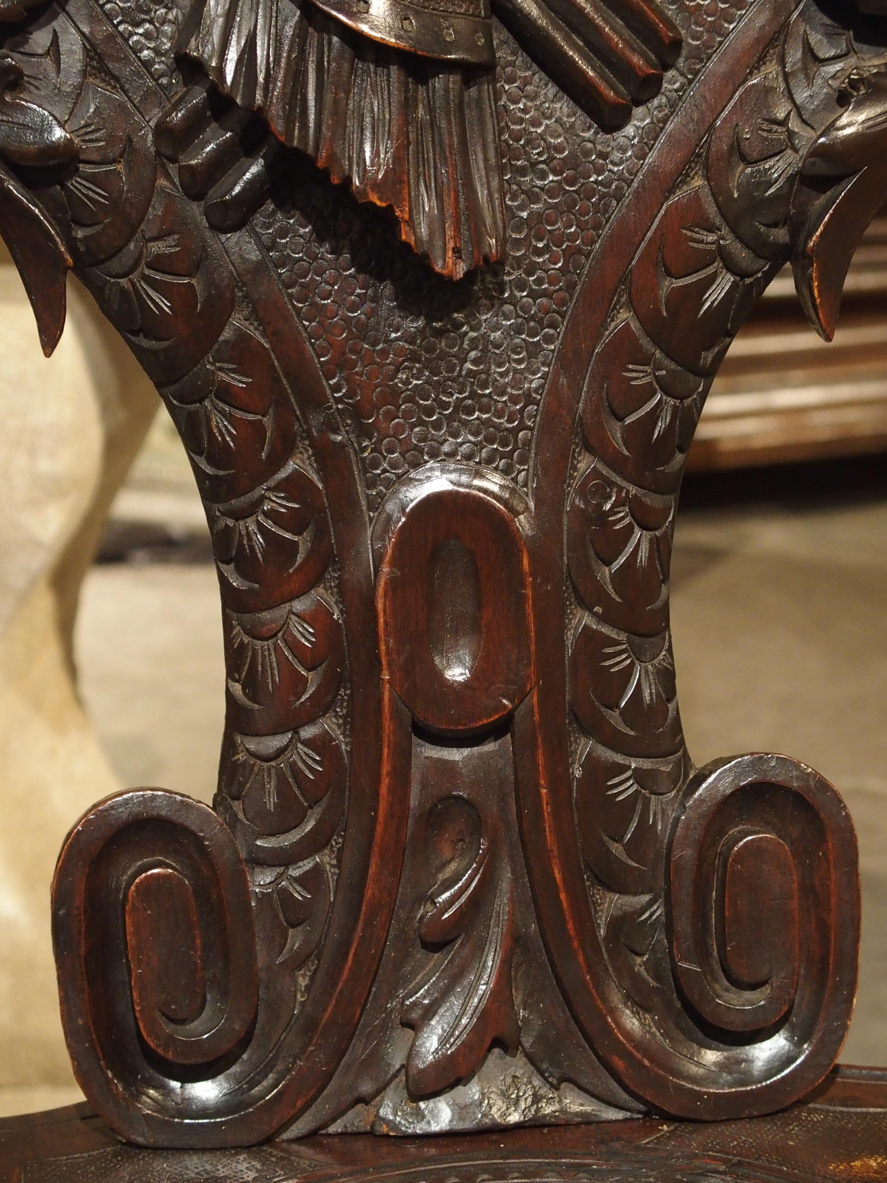 Richly Carved 19th Century Escabelle Chair from Switzerland 1