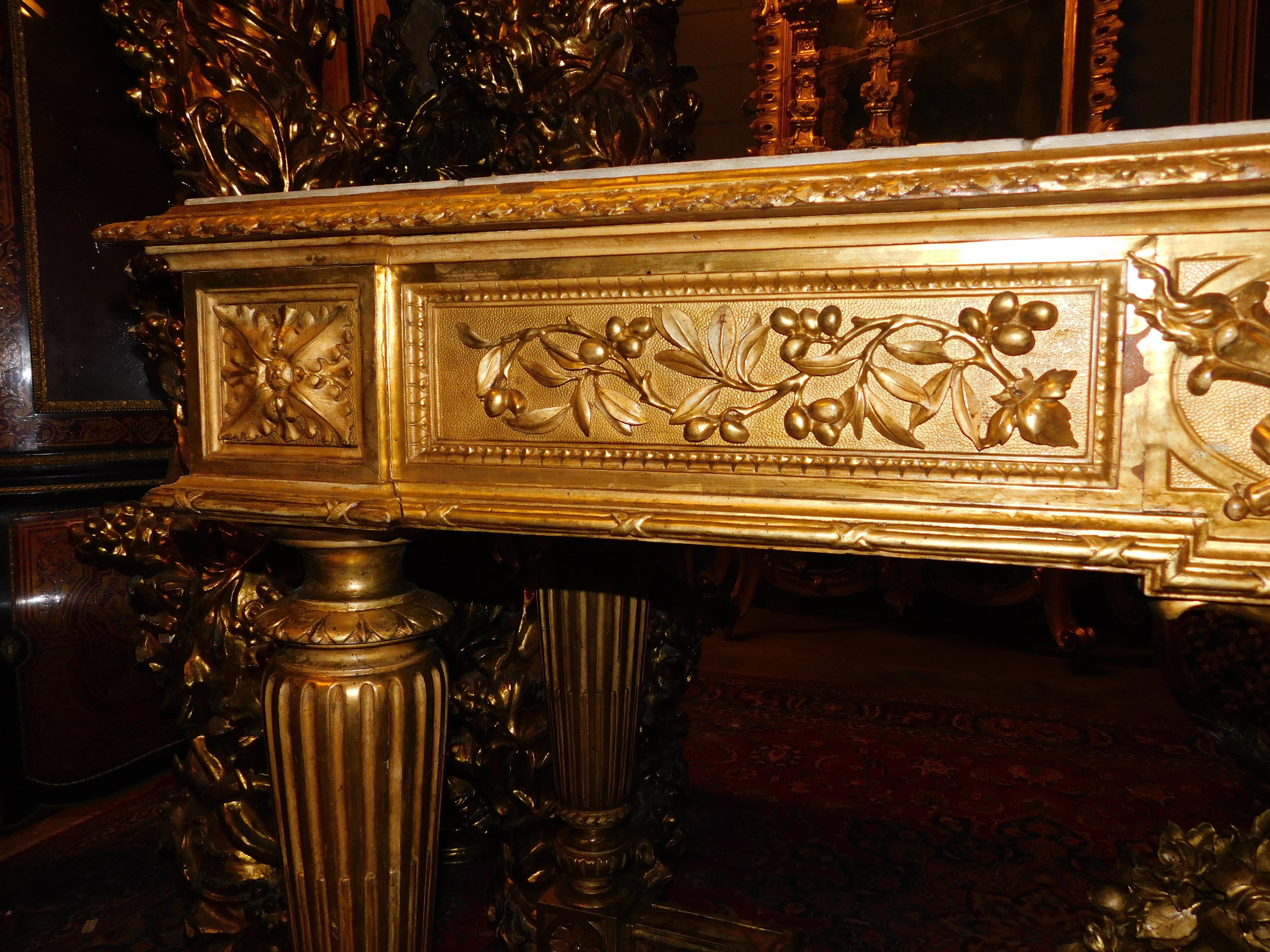 Richly carved and gilded wooden console table, white marble top, Italy For Sale 3