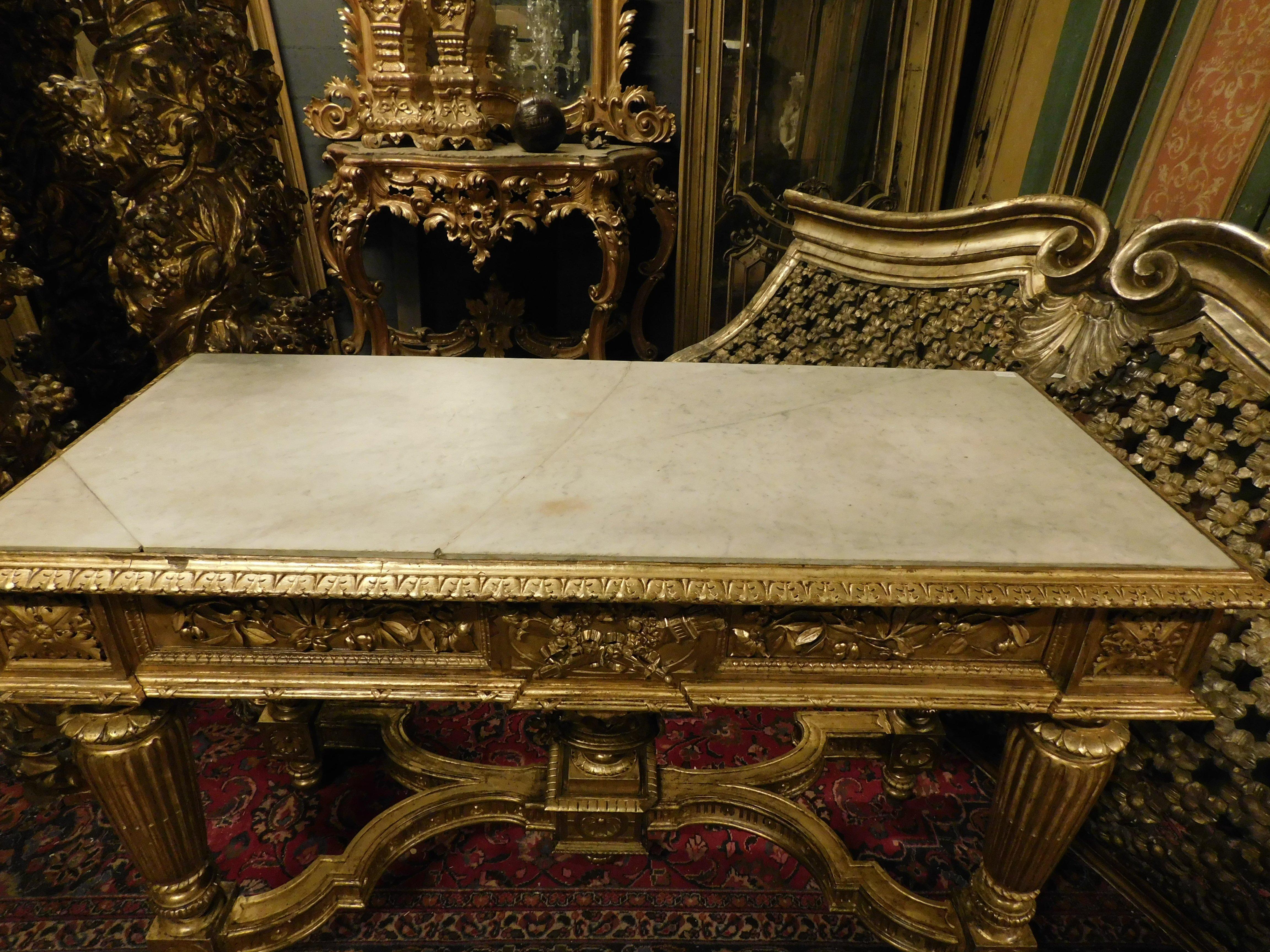 18th Century and Earlier Richly carved and gilded wooden console table, white marble top, Italy For Sale