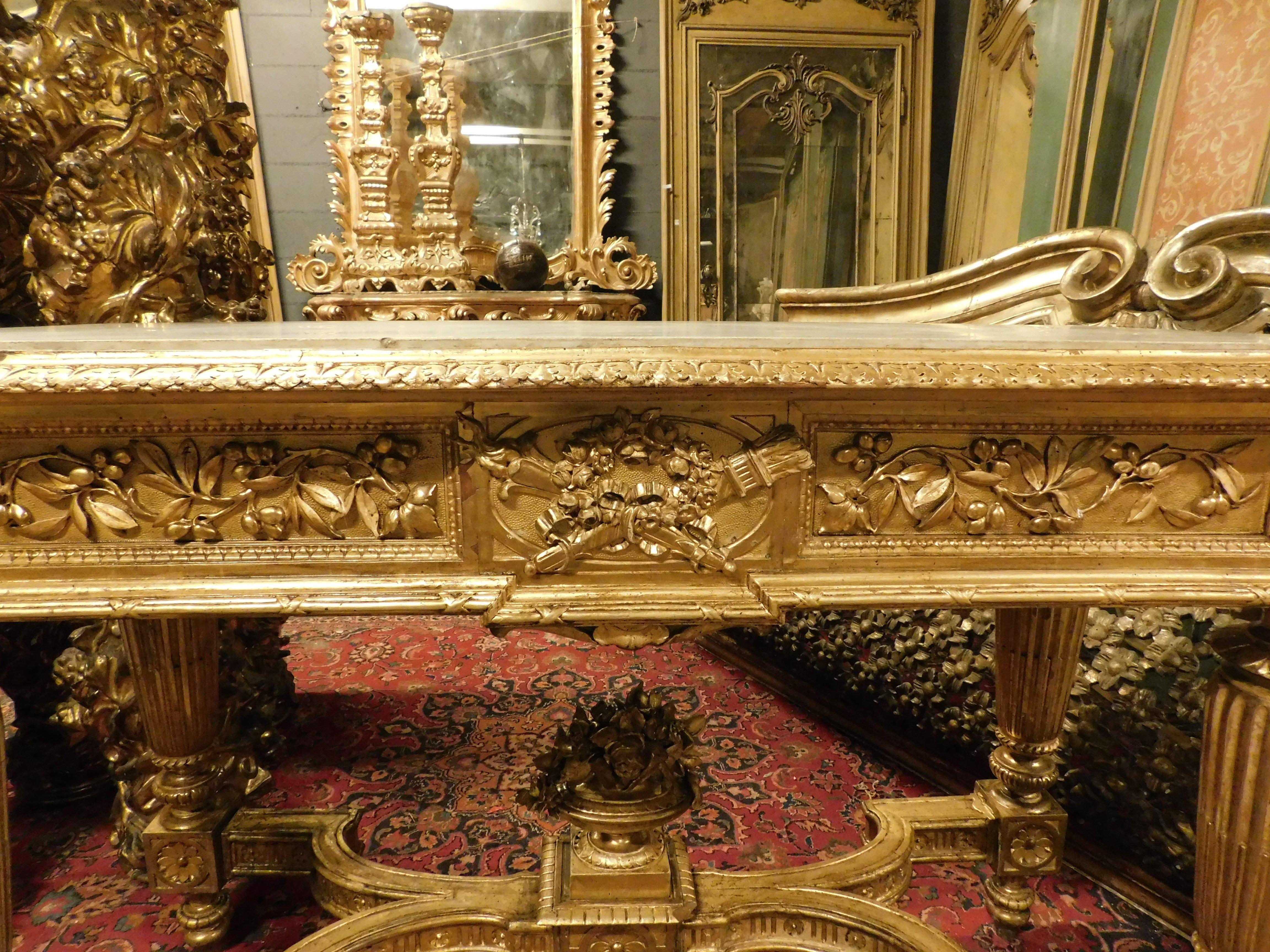 Carrara Marble Richly carved and gilded wooden console table, white marble top, Italy For Sale