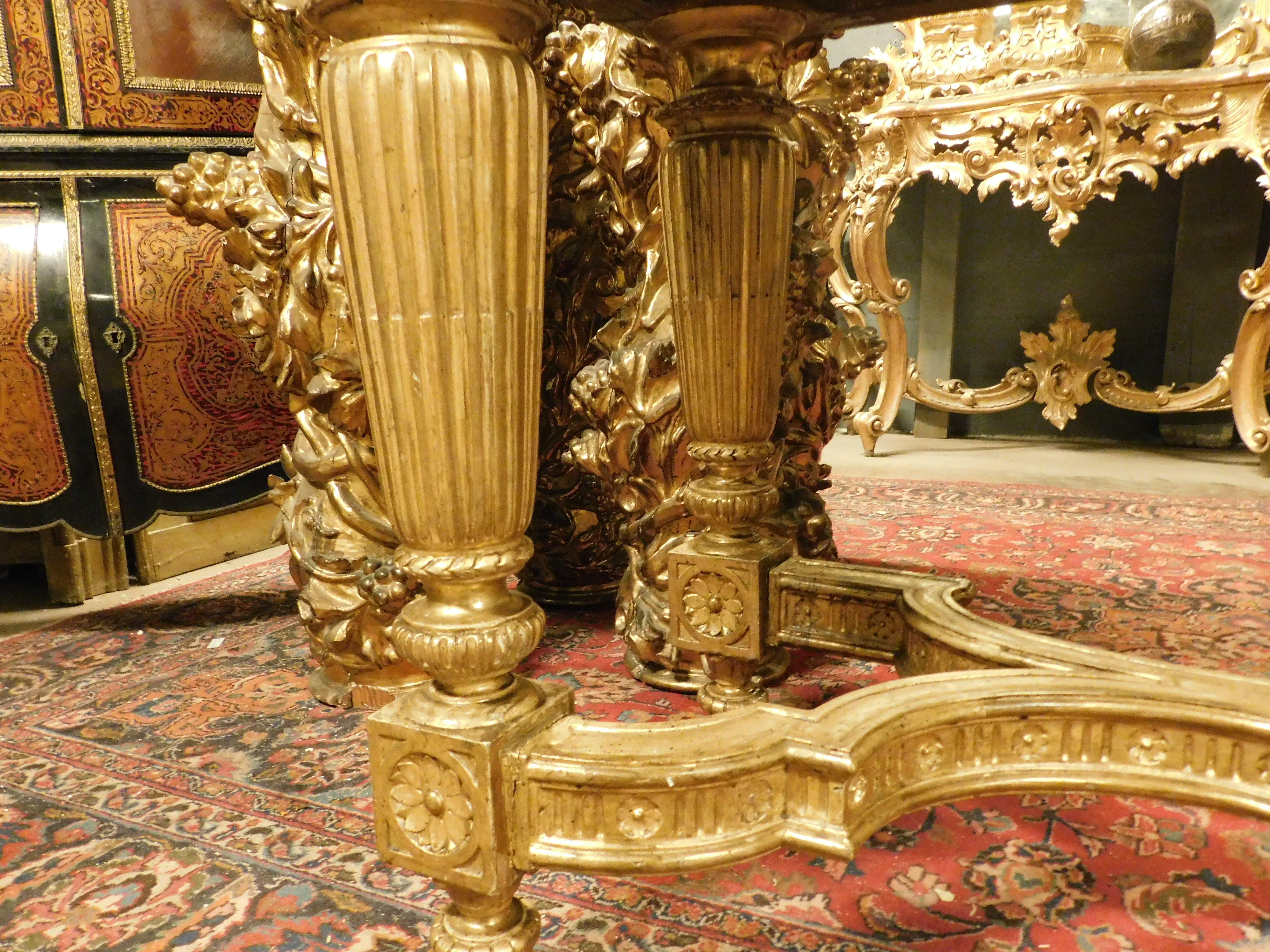 Richly carved and gilded wooden console table, white marble top, Italy For Sale 2