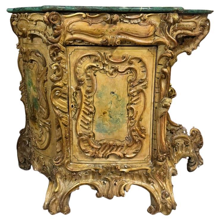 Richly carved and painted sideboard credenzas, Italy