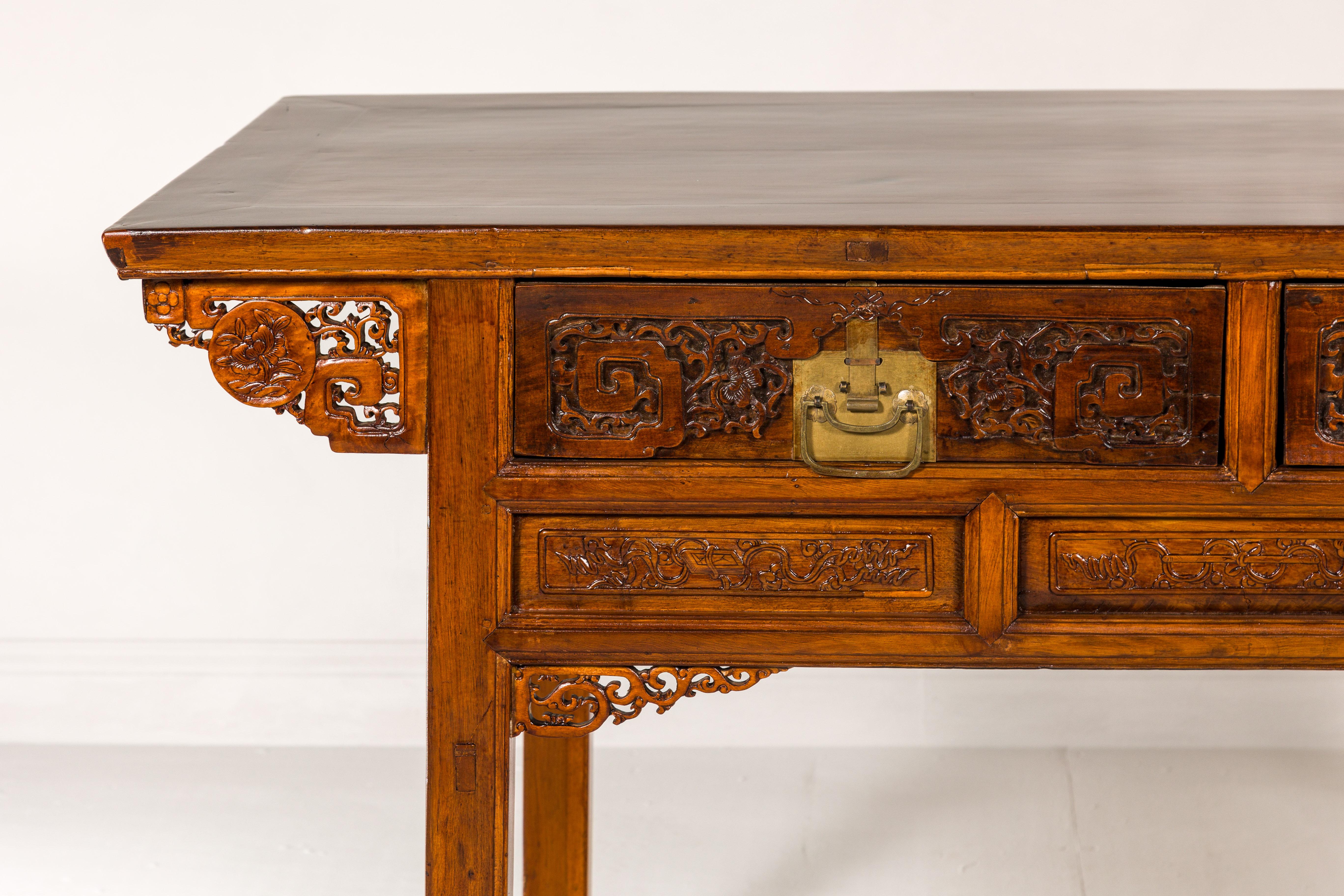 Chinese Richly Carved Console Table with Two Drawers, Scrolling Clouds and Flowers  For Sale
