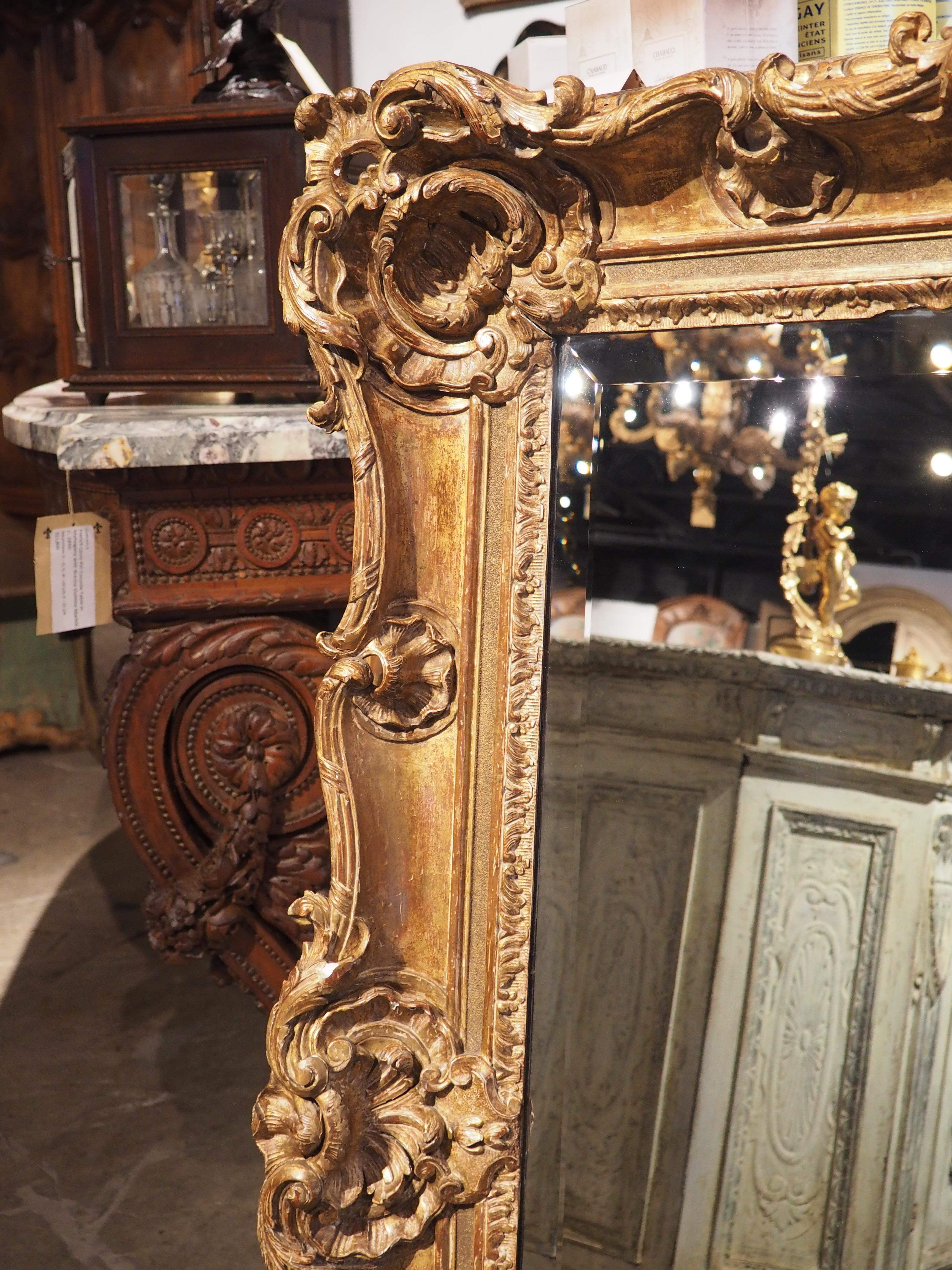 18th Century and Earlier Richly Carved French Louis XV Giltwood Mirror