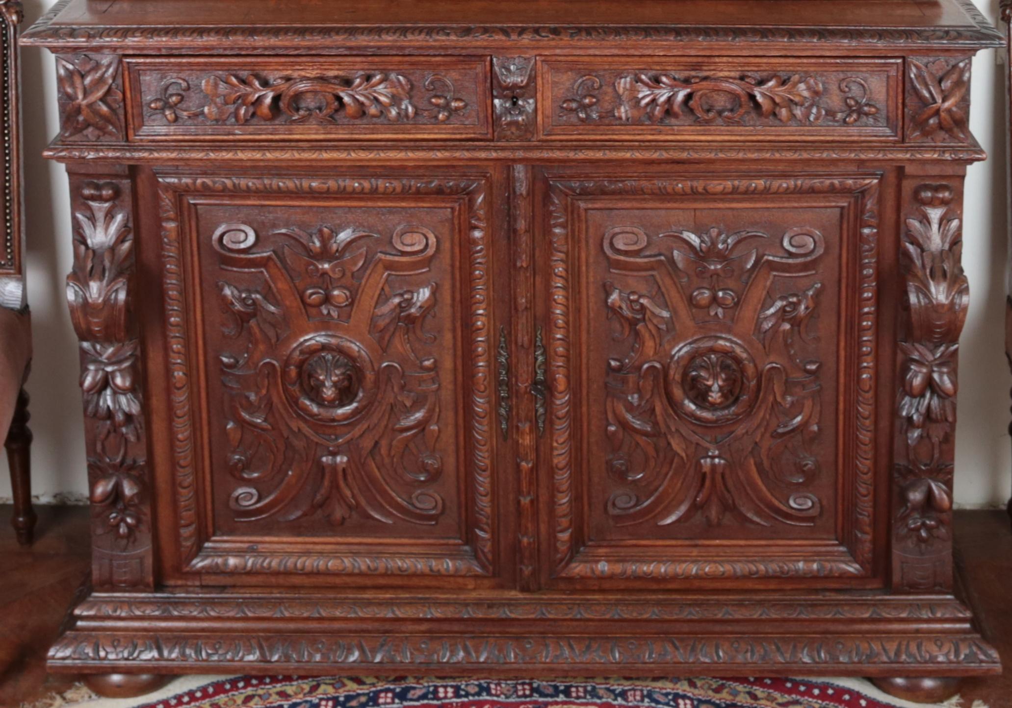 French Richly carved Neo-Renaissance solid oak cabinet For Sale