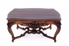 Richly carved table, France, late 19th century.