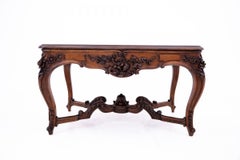 Richly carved table, France, late 19th century.