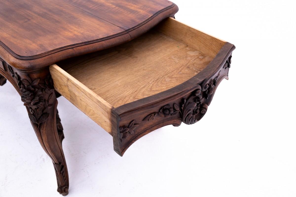 French Richly carved table, France, late 19th century. For Sale