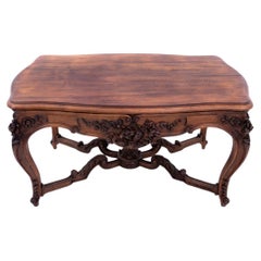 Antique Richly carved table, France, late 19th century.