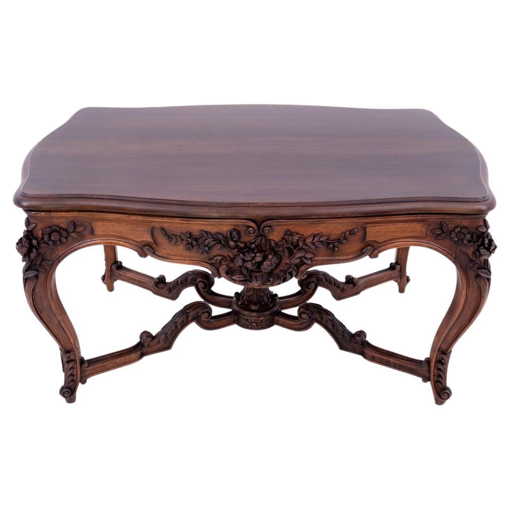 Richly carved table, France, late 19th century.