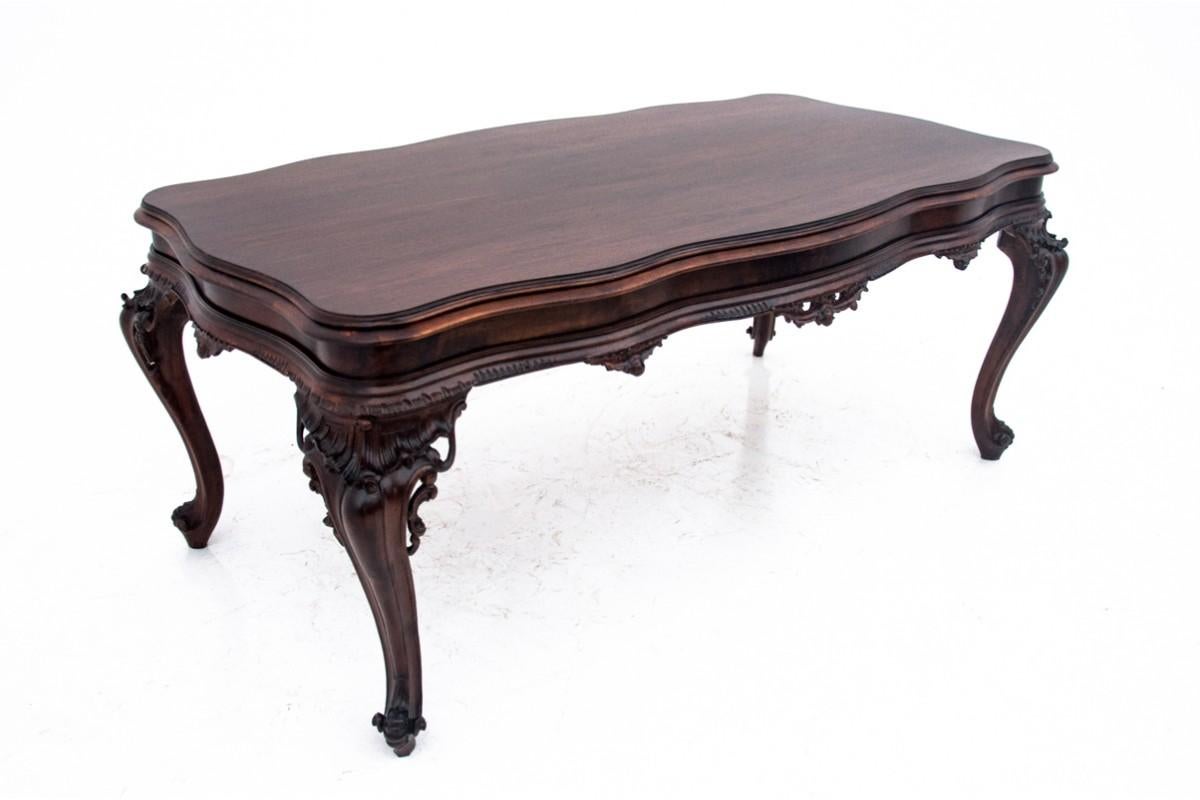 Louis XVI Richly carved table, Southern Europe, first half of the 20th century. After reno