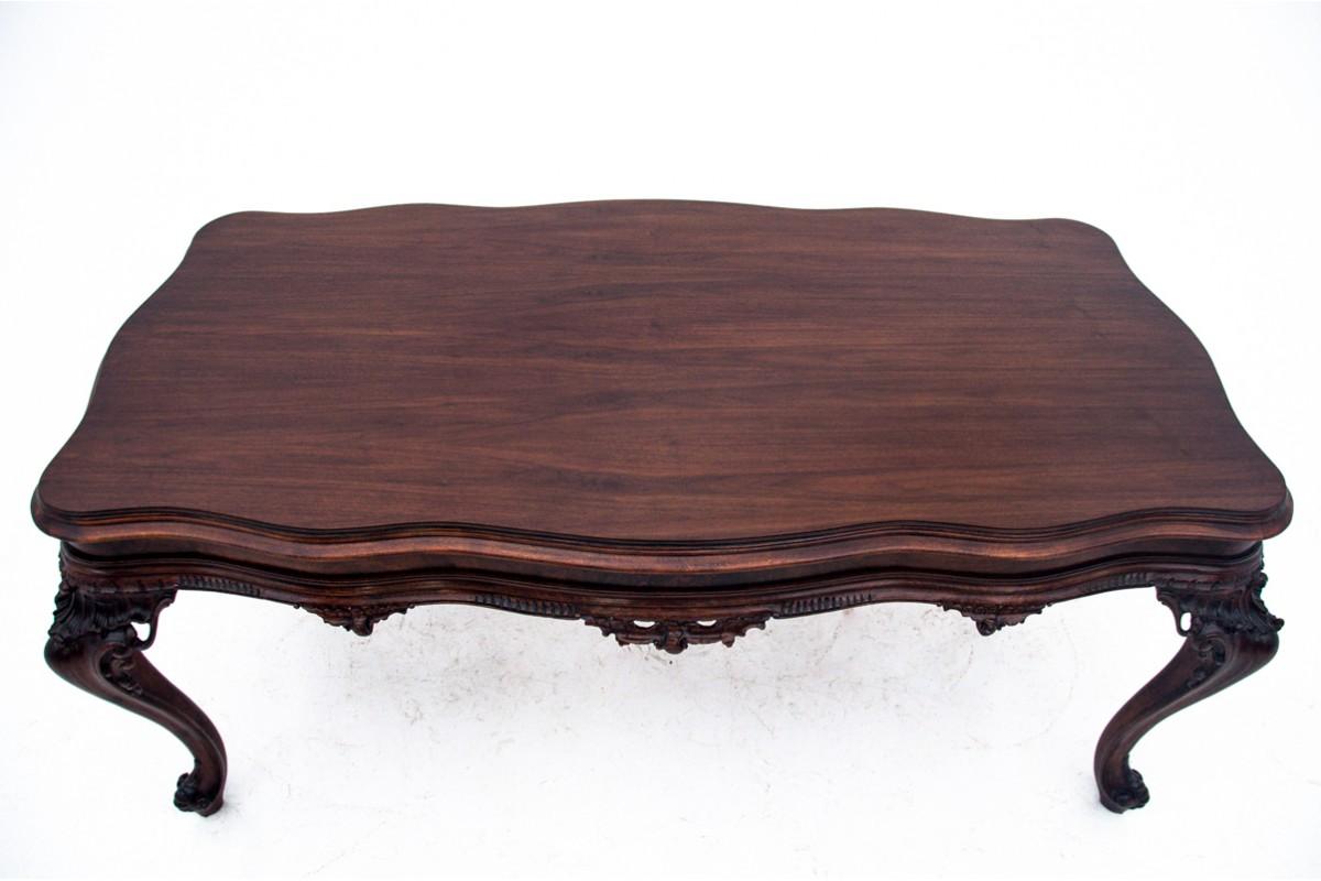 Italian Richly carved table, Southern Europe, first half of the 20th century. After reno