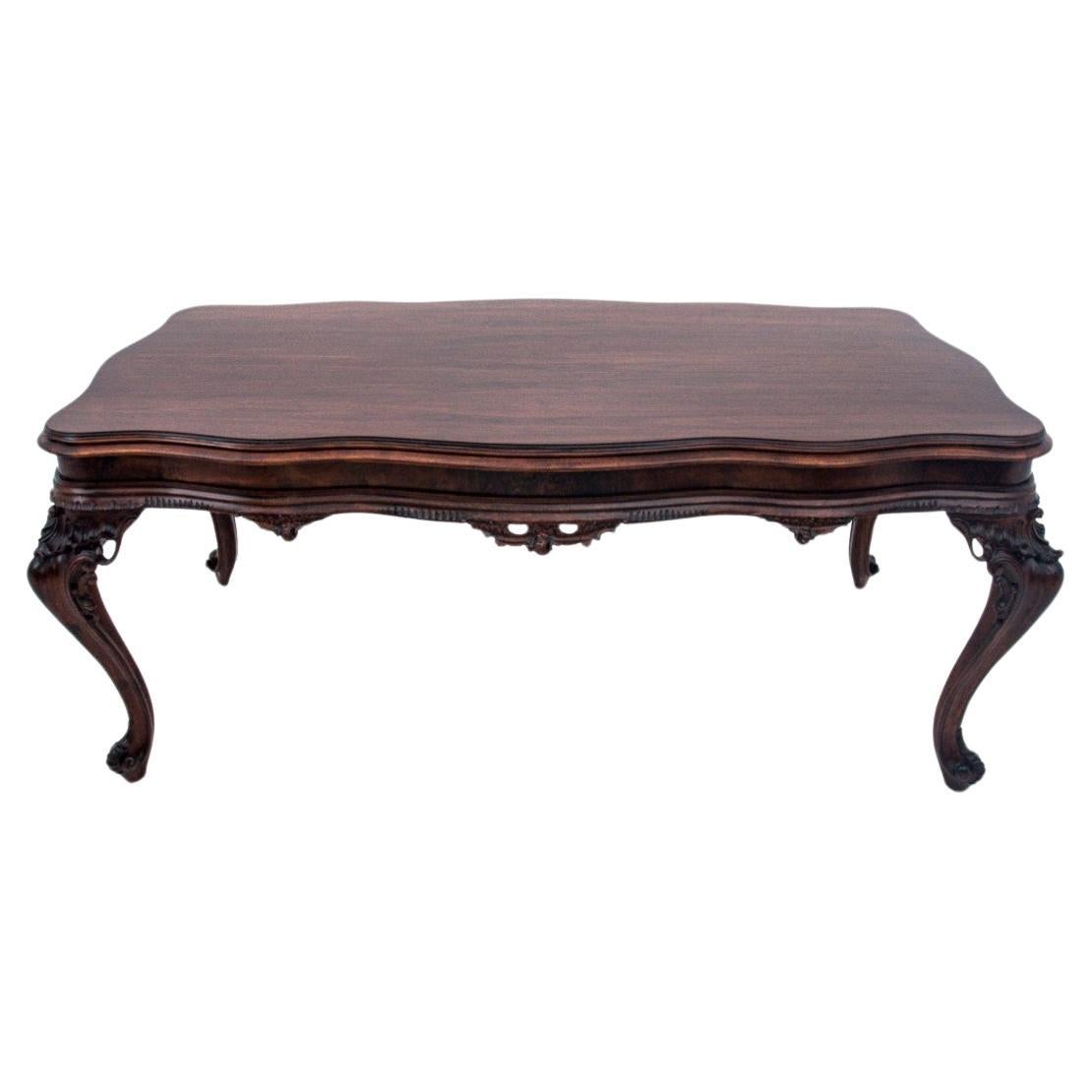 Richly carved table, Southern Europe, first half of the 20th century. After reno For Sale