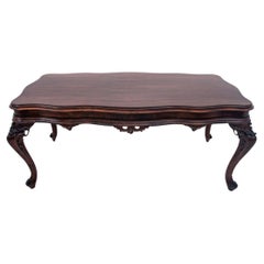 Richly carved table, Southern Europe, first half of the 20th century. After reno