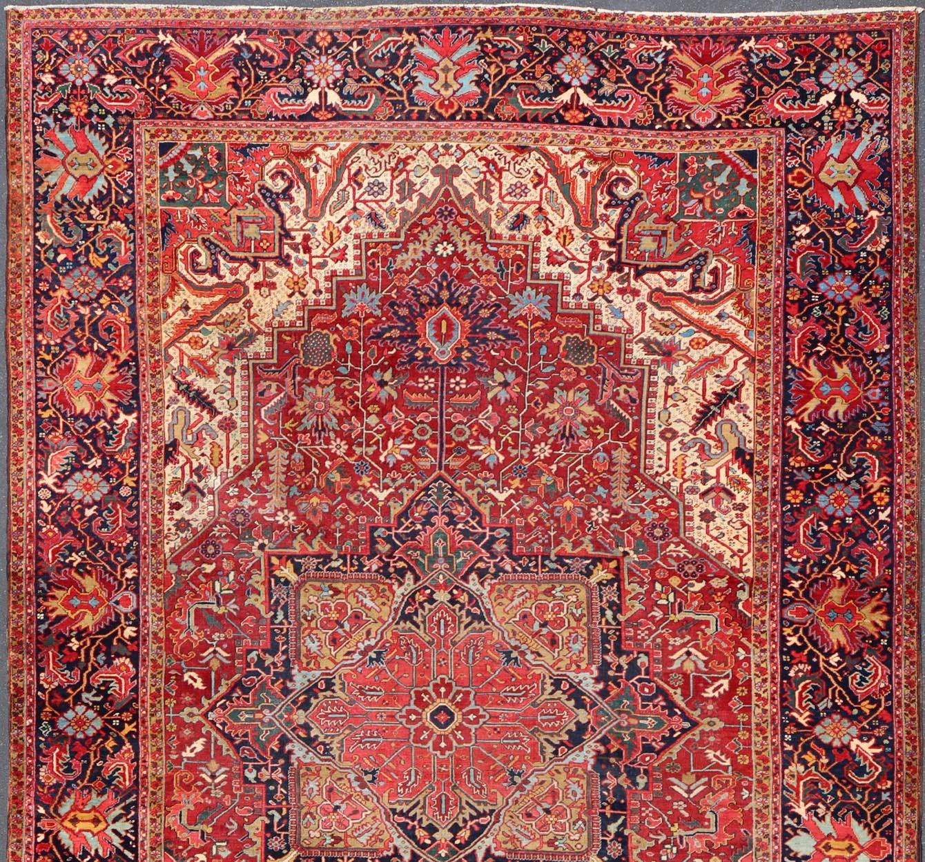 Richly colored large antique Persian Heriz-Serapi carpet with geometric design.  Keivan Woven Arts / rug C-0535, country of origin / type: Iran / Heriz-Serapi, circa 1900.
Measures: 11'4 x 17'11.
This incredible Heriz-Serapi features a large-scale