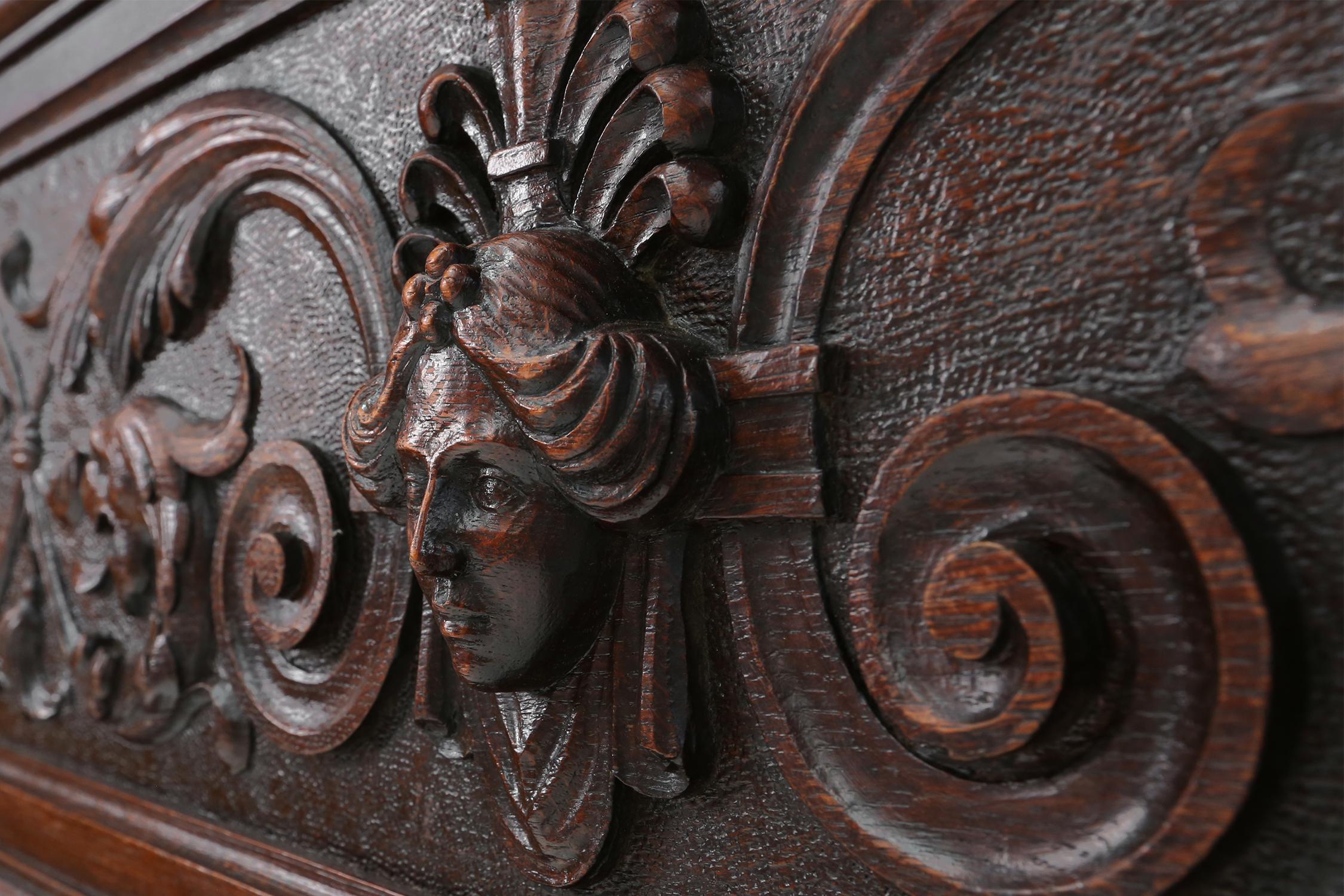 Richly decorated antique fireplace in oak, Belgium ca. 1920 For Sale 2