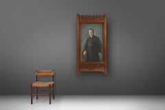 Richly decorated neo-gothic frame with colored photo of a school director, Belgi