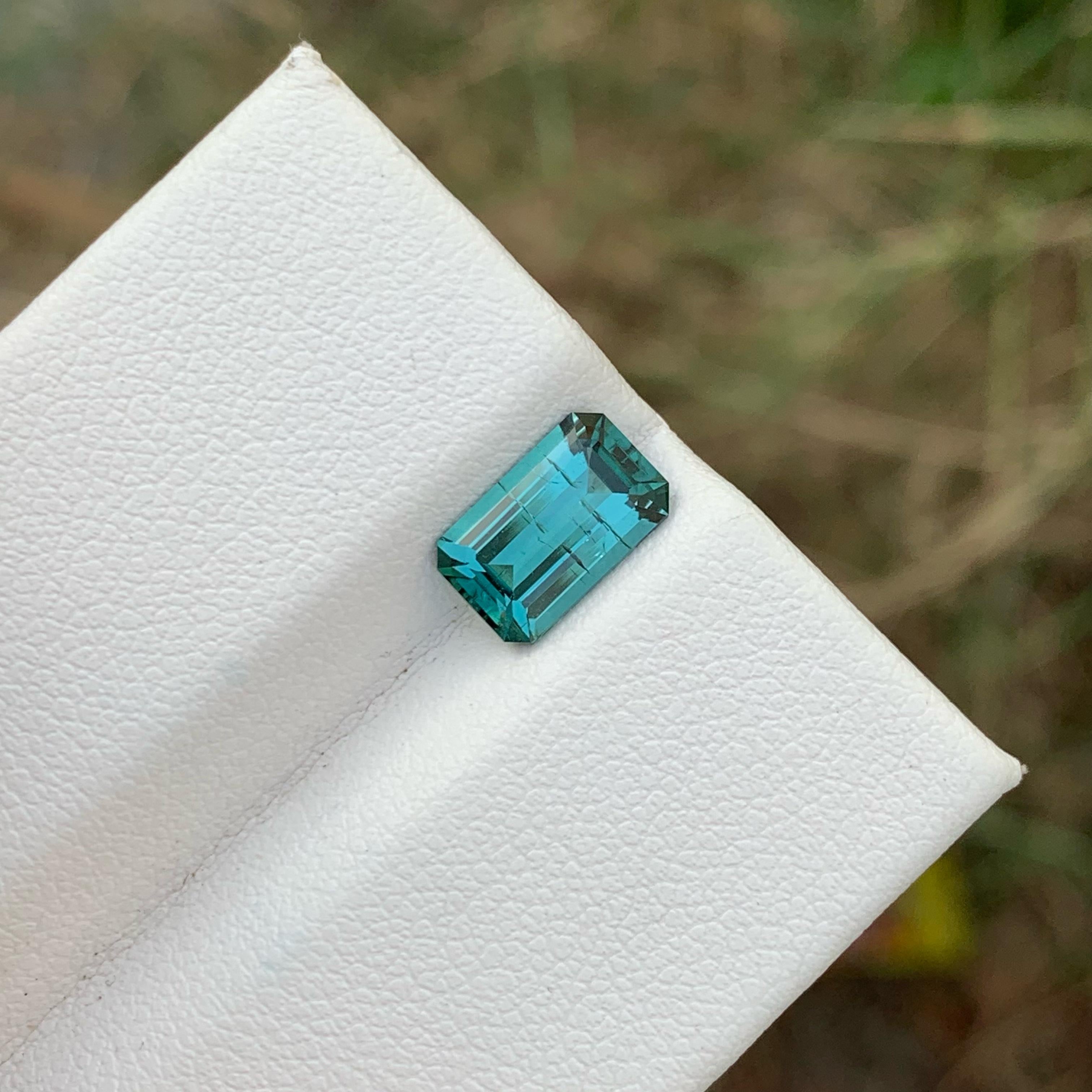 Women's or Men's Richly-hued Blue Tourmaline 1.80 carats Emerald Cut Natural Afghani Gemstone For Sale