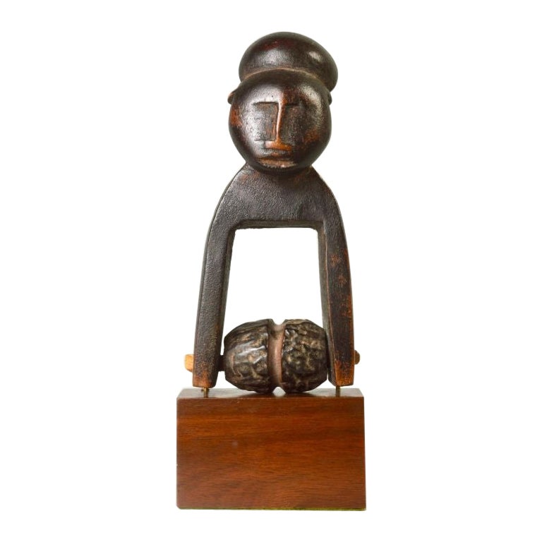 Richly Patinated Anthropomorphic Heddle Pulley in Wood For Sale