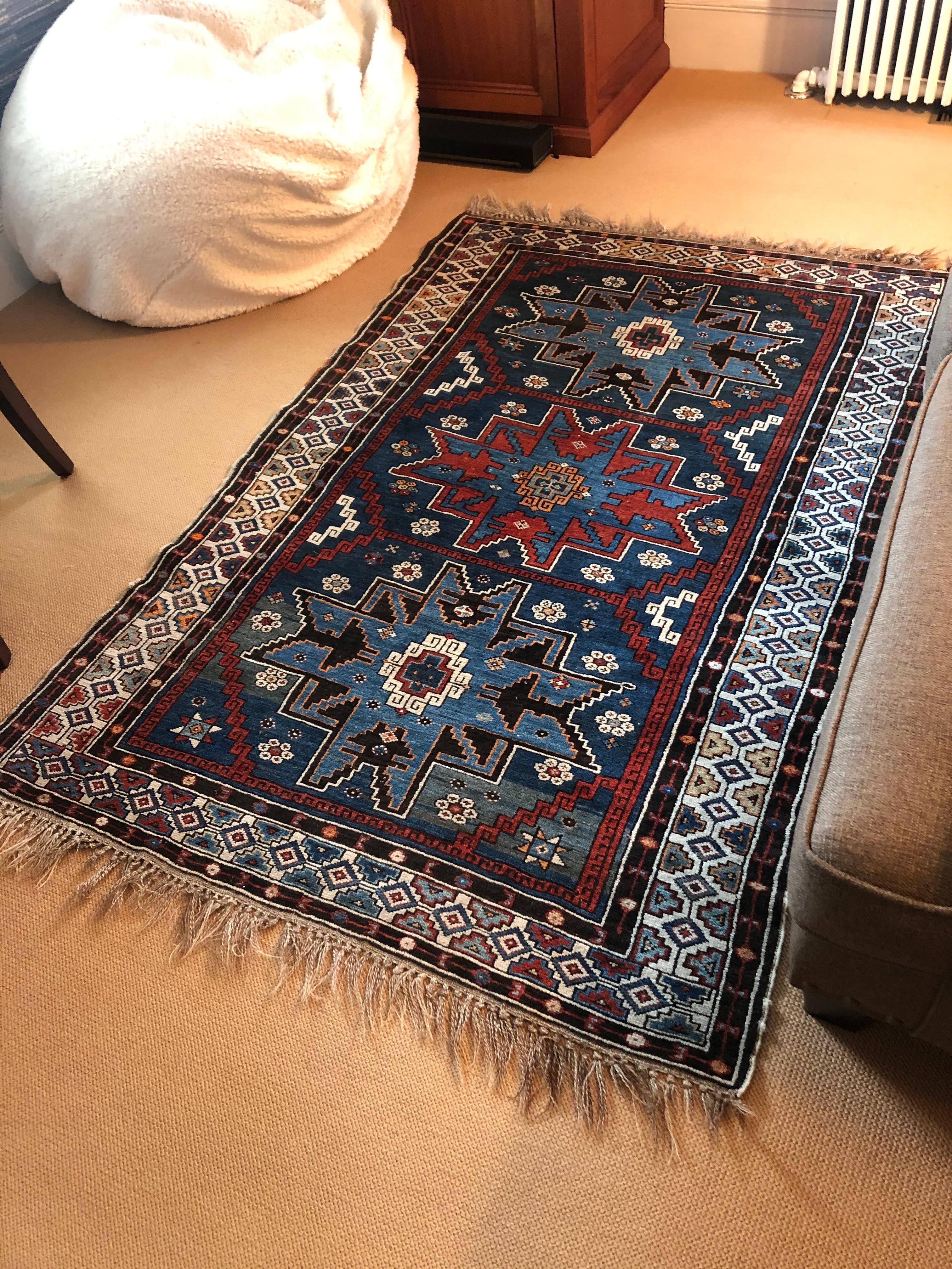 Richly Patterned Antique Area Rug in Blues and Cranberry 1