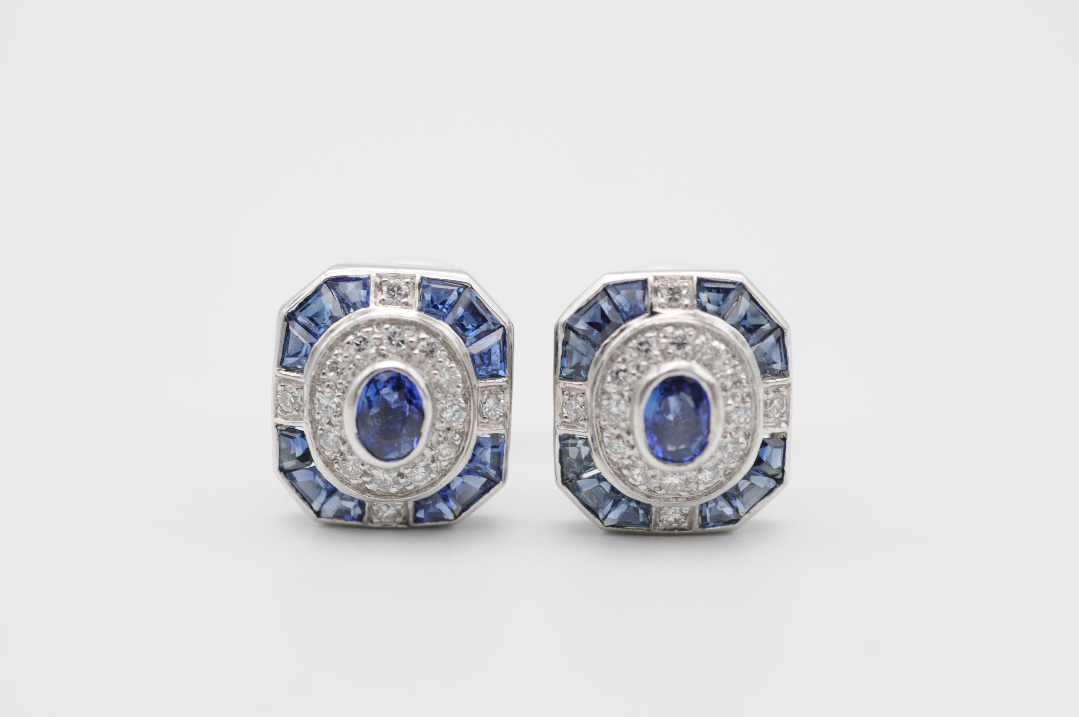 These richly set 18K cufflinks are a true masterpiece of jewelry art. The cufflinks are made of solid white gold, and each one is hallmarked with the number 31054, which confirms the authenticity and high quality of the piece. The cufflinks are set