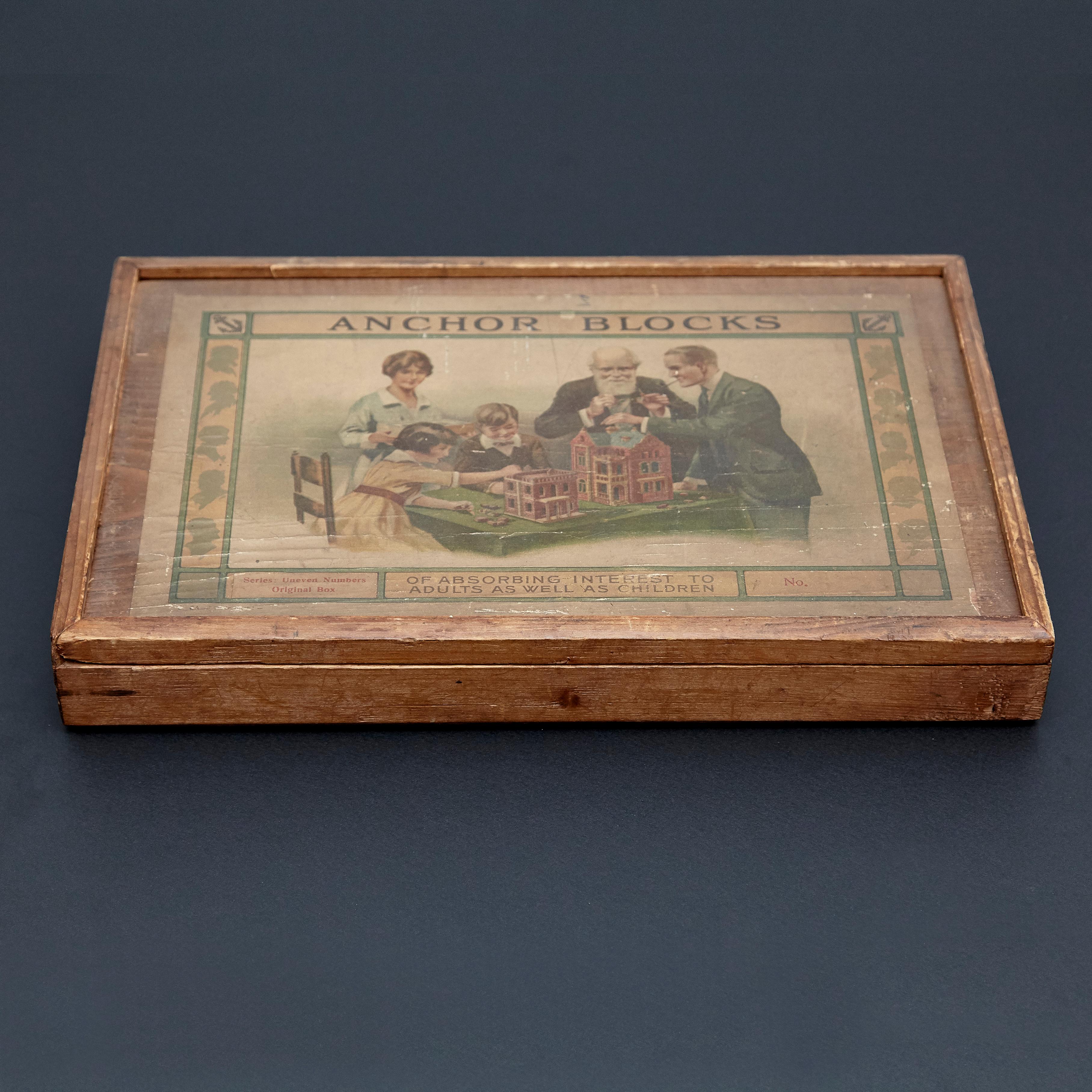 Richters German anchor blocks building toys / Der Geschickte Baumeister
Made in Rudolstadt, Germany, circa 1900. 

Wooden box with printed paper labels, stone blocks and instructional booklets.

In original condition, weak wooden box and broken