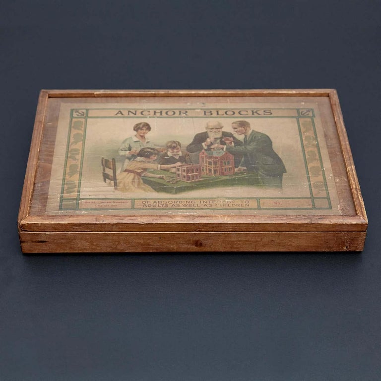 Richters German anchor blocks building toys / Der Geschickte Baumeister
Made in Rudolstadt, Germany, circa 1900. 

Wooden box with printed paper labels, stone blocks and instructional booklets.

In original condition, weak wooden box and broken