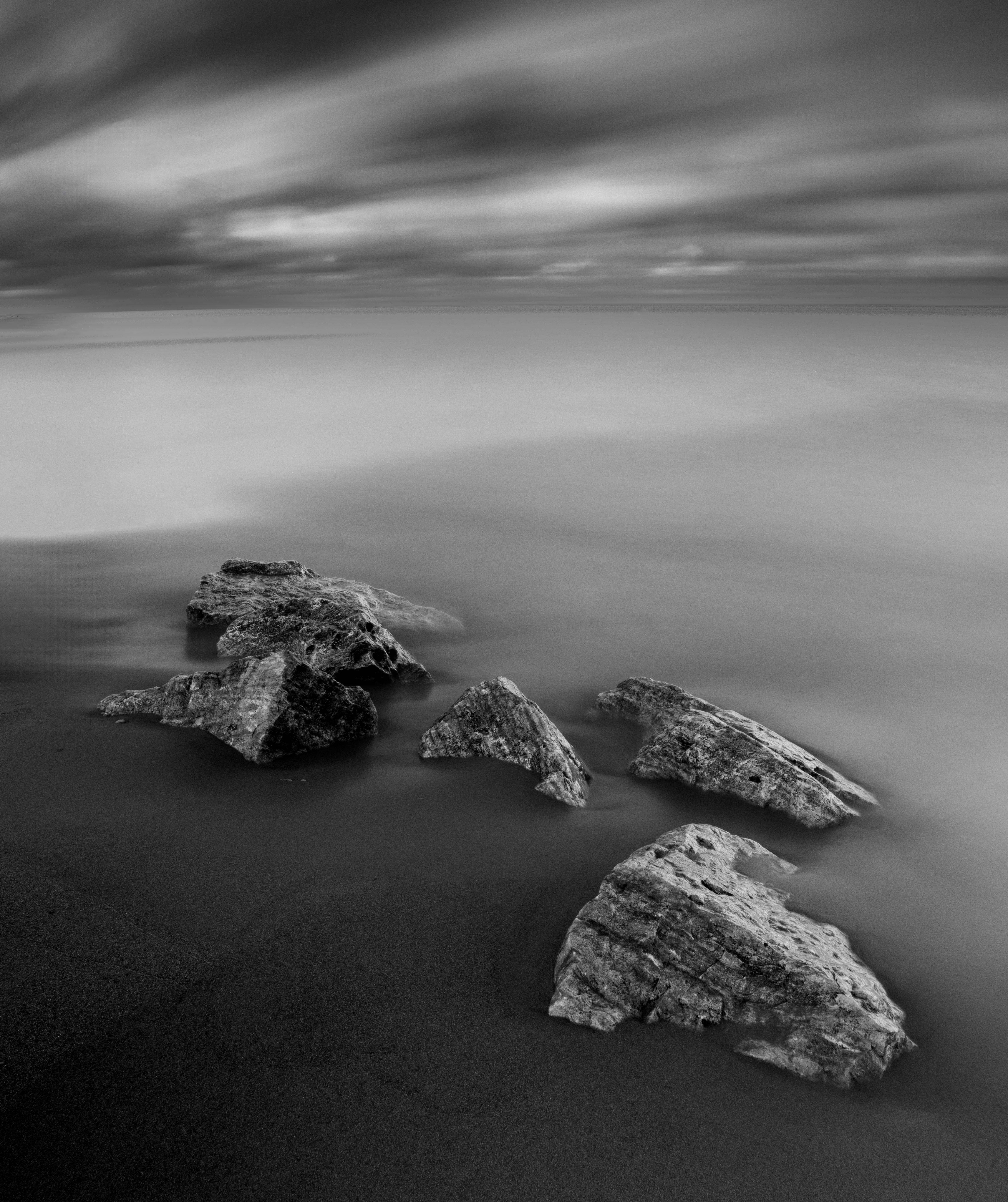 Rick Bogacz Black and White Photograph - "Rocks in Shallow Water", signed archival pigment print