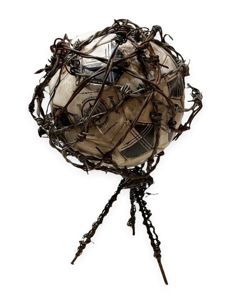 FIFA - Found Object Sculpture with Deflated Soccer Ball and Barbed Wire ...