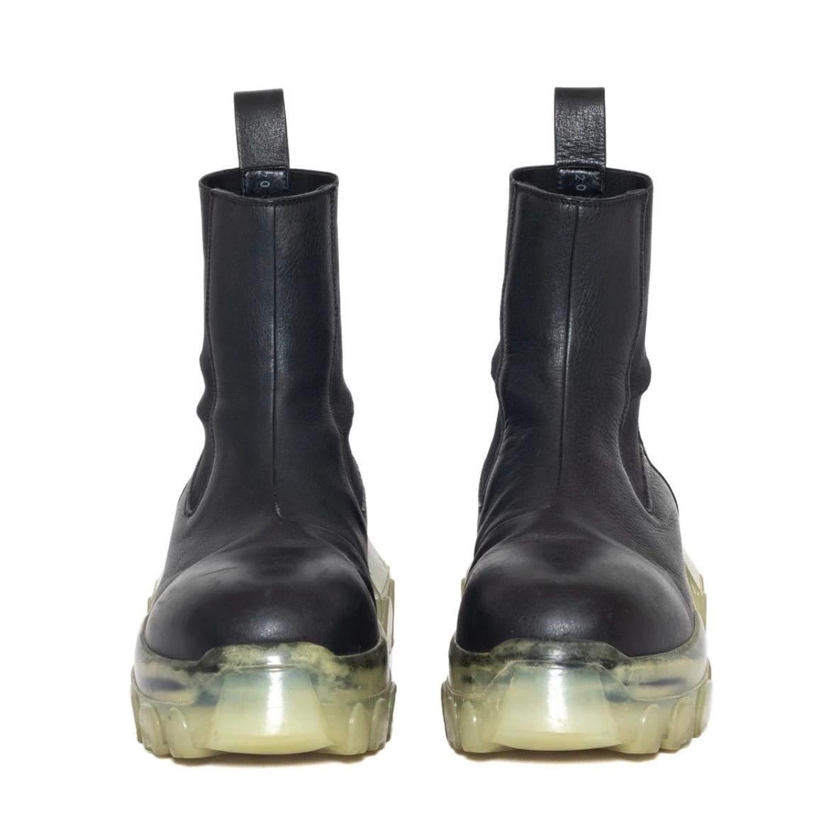 Rick Owens Black and Transparent Beatle Bozo Tractor Boots Size 38

Beatle Bozo Tractor Boots
Spring 2021 Phlegethon Collection
Black leather calfskin upper
Transparent rubber sole
Signature chunky outsole
Back pull strap
Elasticized side