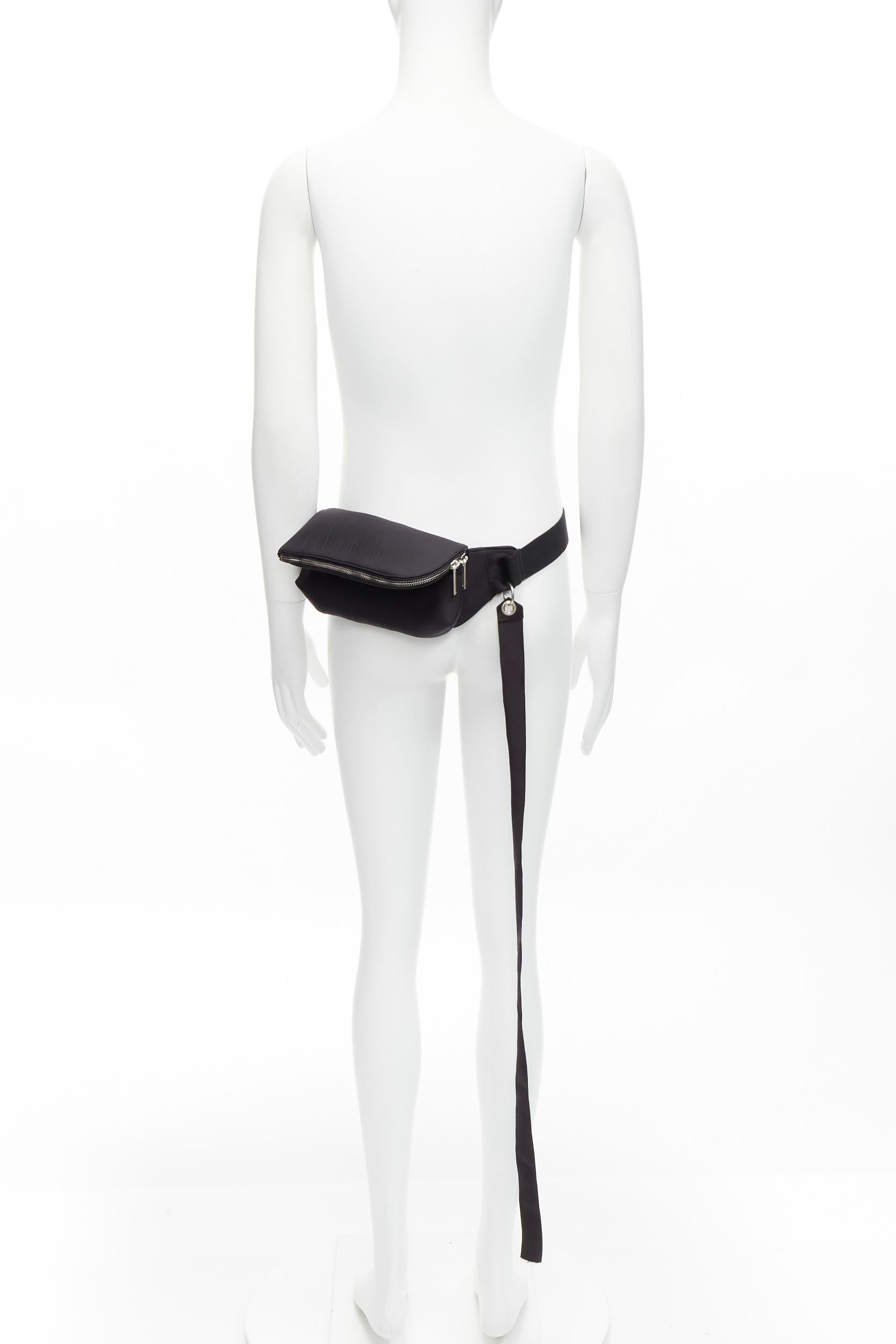 RICK OWENS black blistered neoprene silver zippers crossbody belt bag
Reference: TGAS/D00199
Brand: Rick Owens
Designer: Rick Owens
Material: Neoprene, Plastic, Fabric
Color: Black, Silver
Pattern: Solid
Closure: Zip
Lining: Black Fabric
Extra