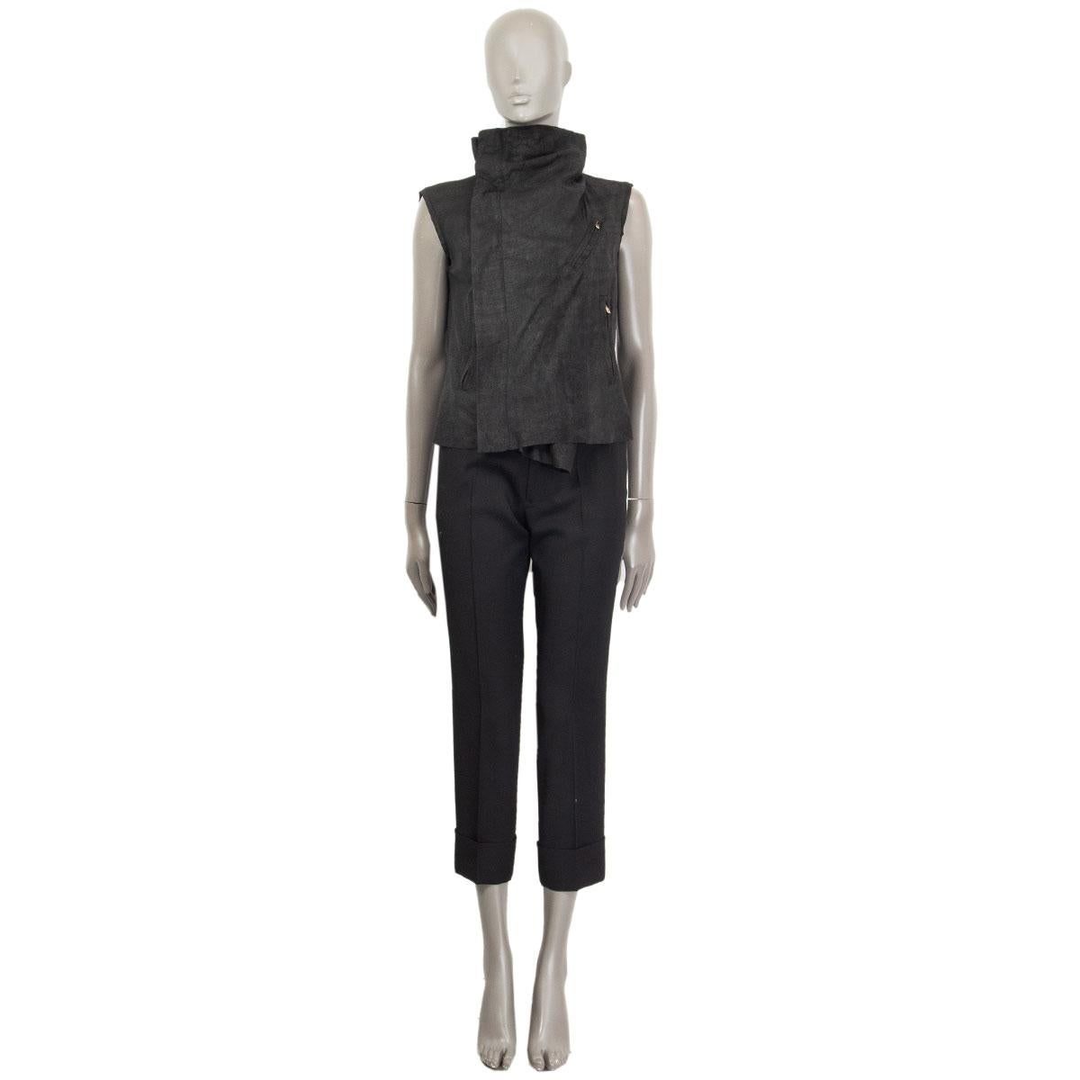 100% authentic Rick Owens asymmetrical zipper vest in black distressed leather with two zipper pockets and one chest pocket. Lined in black viscose blend. Has been worn and is in excellent condition. 

Measurements
Tag Size	Missing Tag