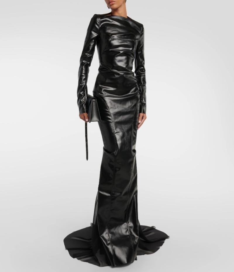 RICK OWENS

Embrace Rick Owen’s distinctive aesthetic with this edgy gown. This style is made from rubberized coated cotton with wrap-like ruching throughout, extended palm-covering sleeves, and an artfully cascading train.

Content: 91% cotton, 6%