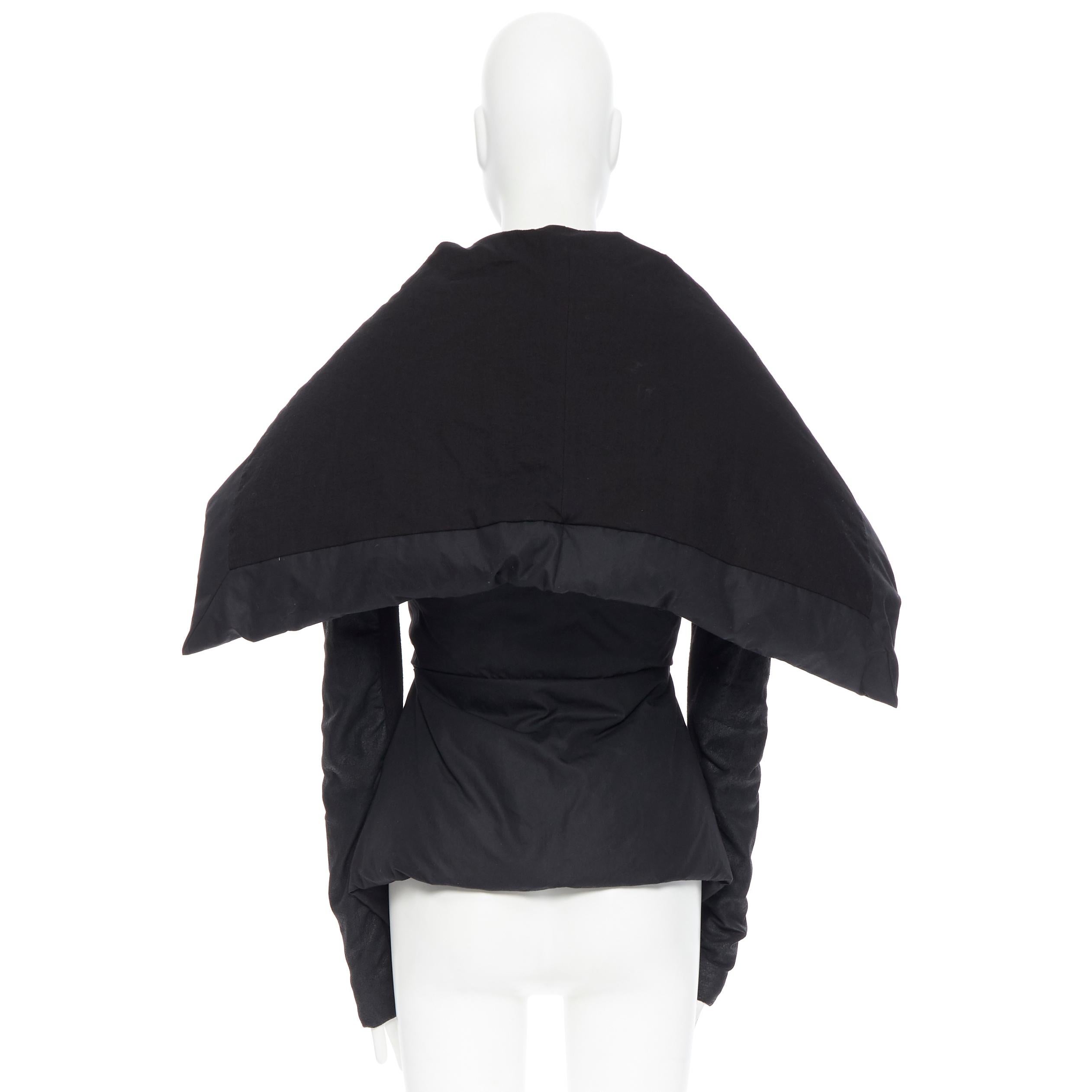 RICK OWENS black goose down leather sleeve oversized collar belted jacket IT42 S 
Reference: LNKO/A01206 
Brand: Rick Owens 
Designer: Rick Owens 
Material: Cotton 
Color: Black 
Pattern: Solid 
Extra Detail: Goose feather padded. Cotton blend