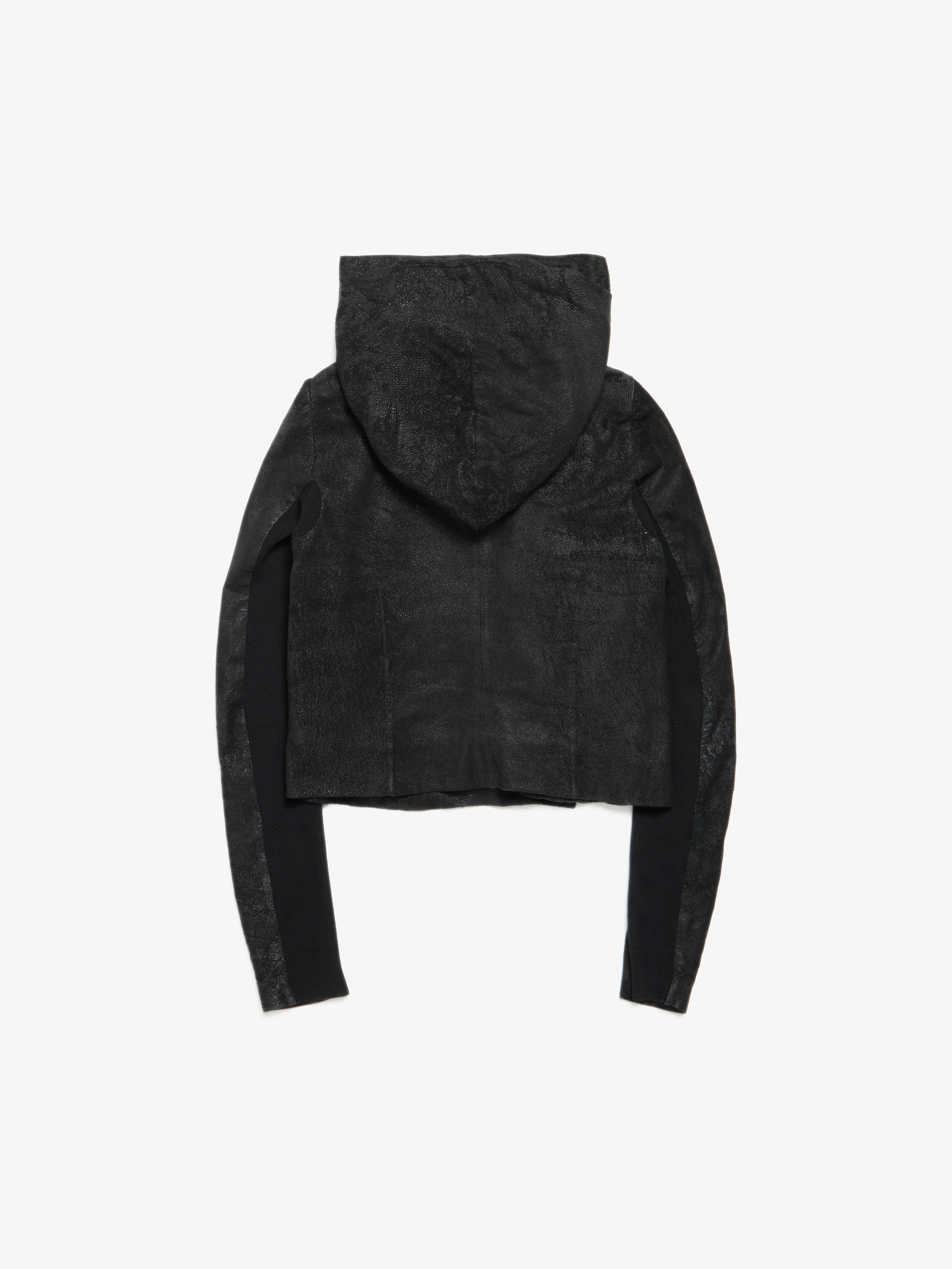 Rick Owens  Black Hooded Cropped Blistered Leather Jacket
Size marked: 44
Condition: Gently used
Material: 90% Lamb leather / 10% Wool / 60% Cotton / 40% Rayon
Measurements: Shoulder to shoulder (cm) 41/ pit to pit (cm) 48/ Length (cm) 55/ sleeve