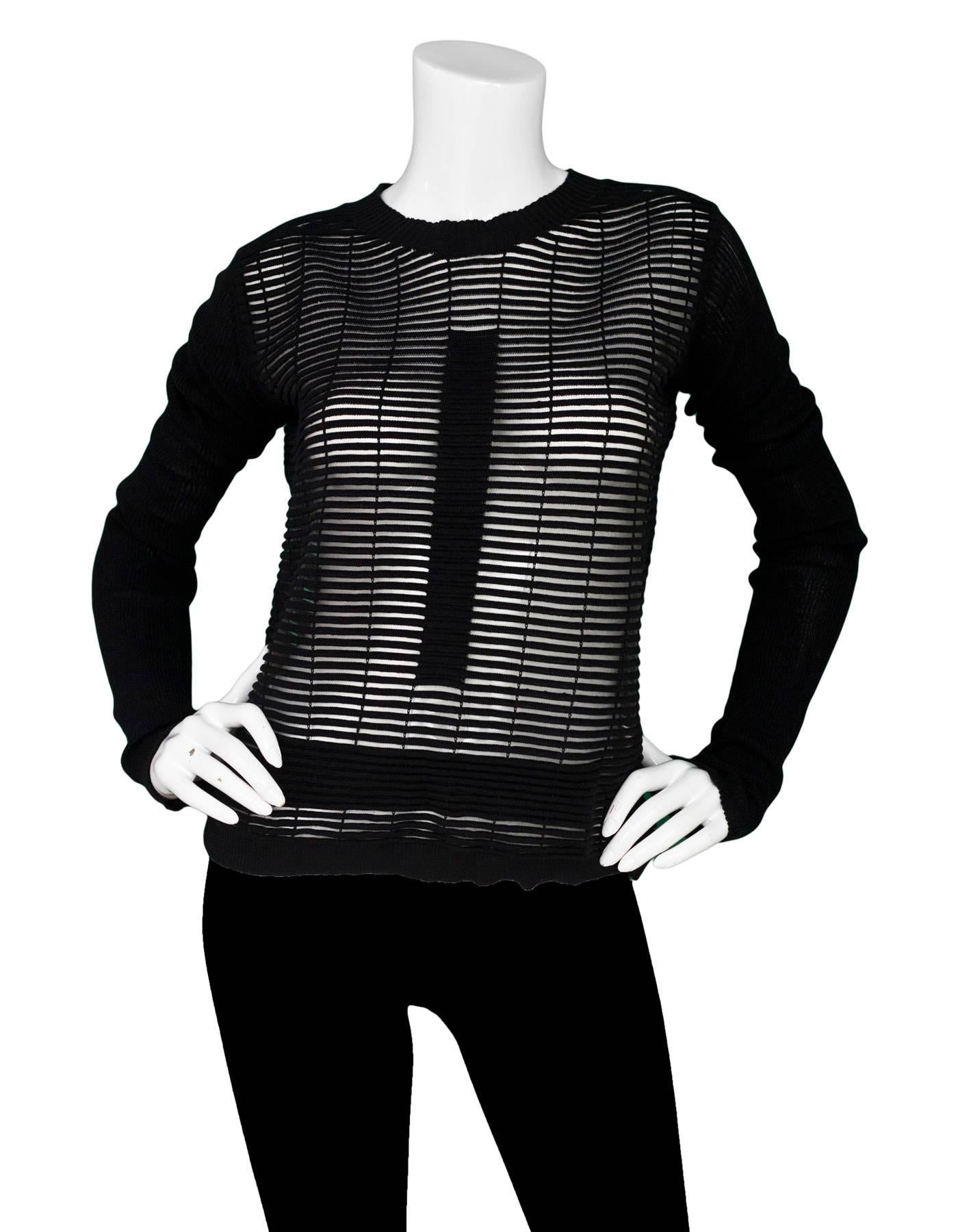 Rick Owens Black Mesh Stripe Top

Color: Black
Composition: Not listed, feels like nylon blend
Lining: None
Closure/Opening: Pull over
Overall Condition: Excellent pre-owned condition, minor stretching at arm opening
Marked Size: Not listed, refer