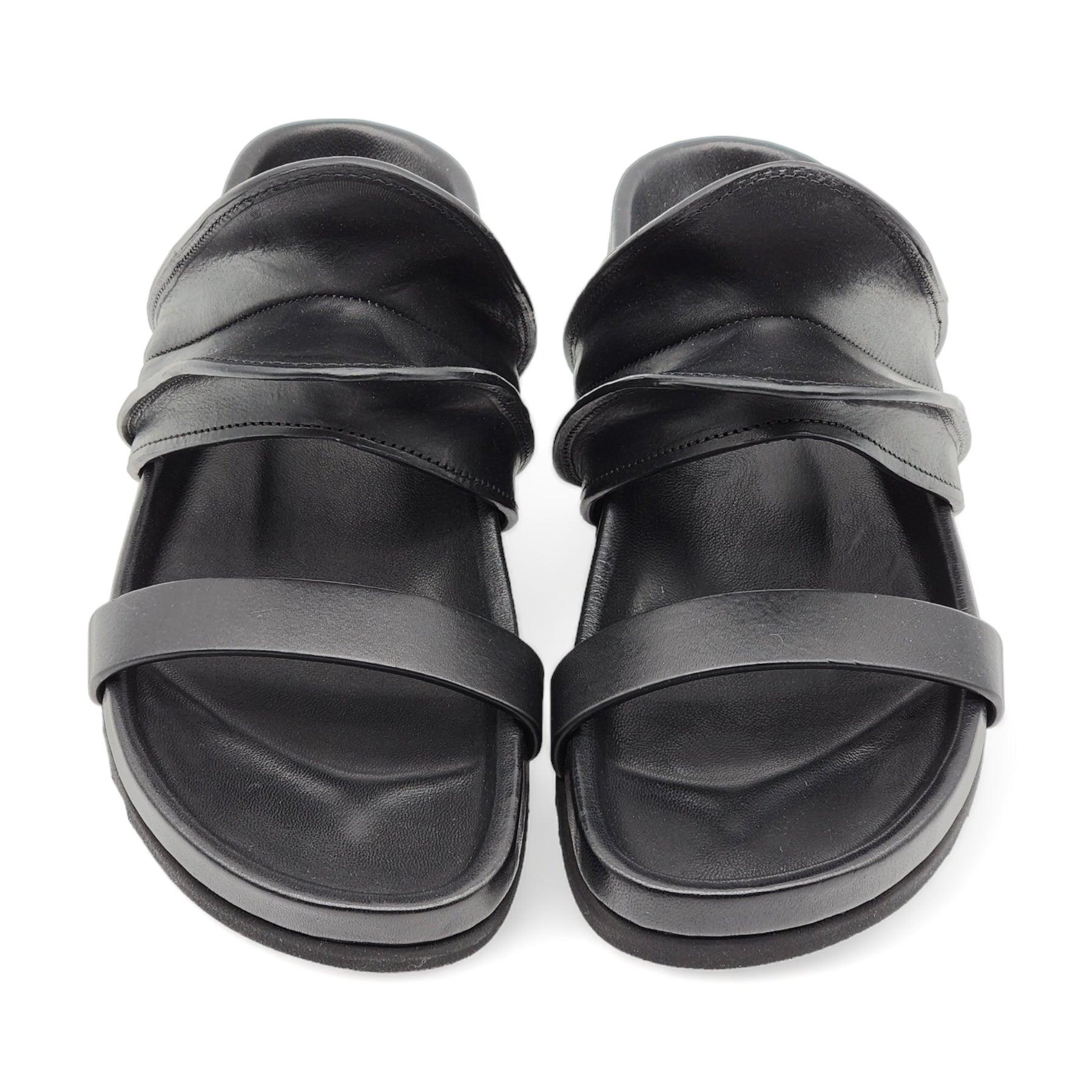 Brancusi leather sandals by Rick Owens.

Additional information:
Material: Leather
Color: Black
Size: 36 EU
2022 Collection
Country: Italy
