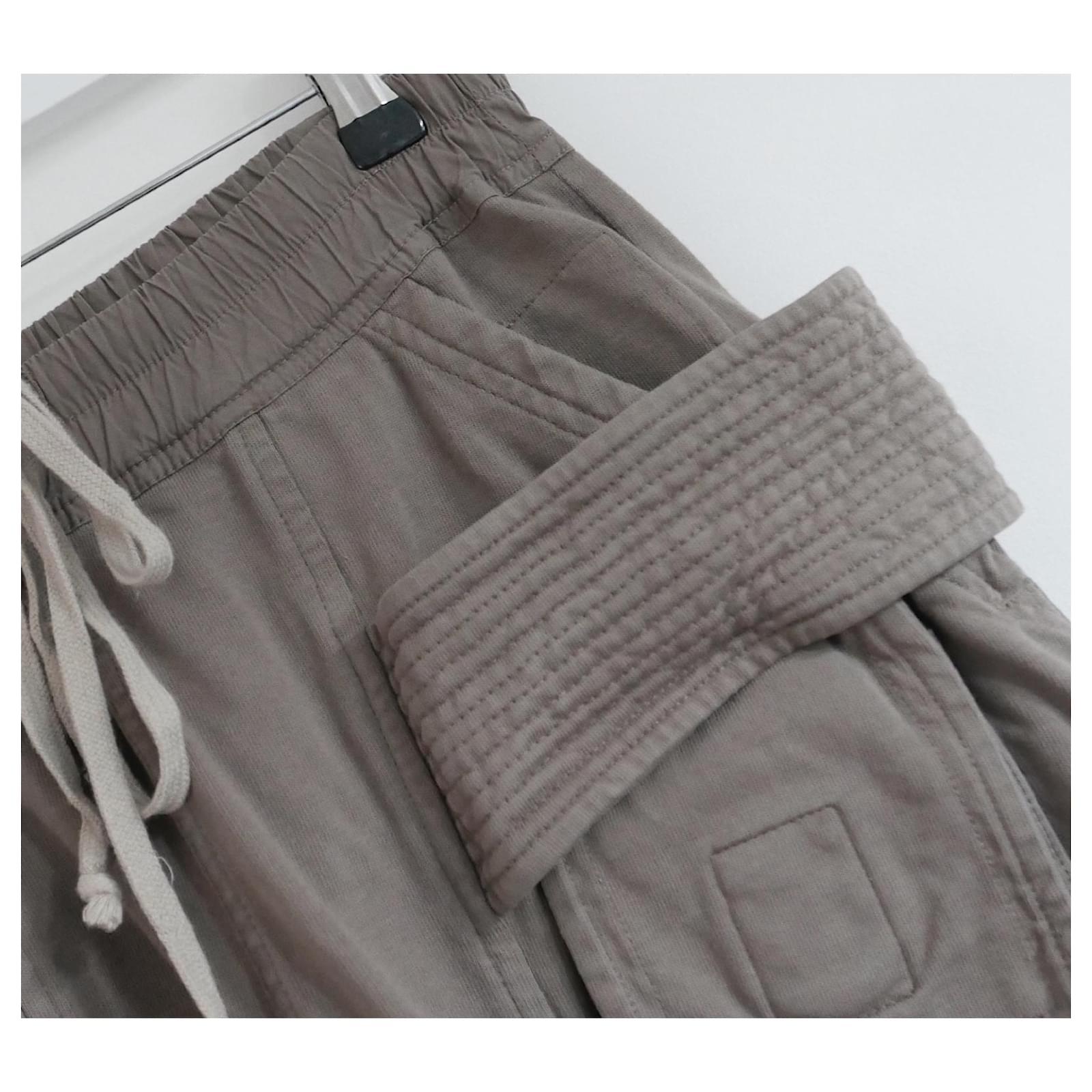 Super rare Rick Owens DRKSHDW Creatch cargo pants - model ref DS19F6327-RIG. Worn once. Unisex. Made from thick fawn coloured vintage look cotton jersey with contrast trims. They have multiple pockets, quilted strap details, elasticated drawstring