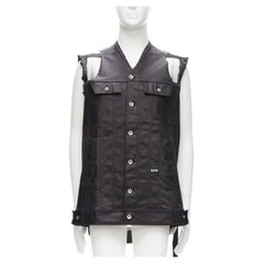 RICK OWENS DRKSHDW Jumbo Trucker Schwarze dekonstruierte Weste aus beschichtetem Denim M