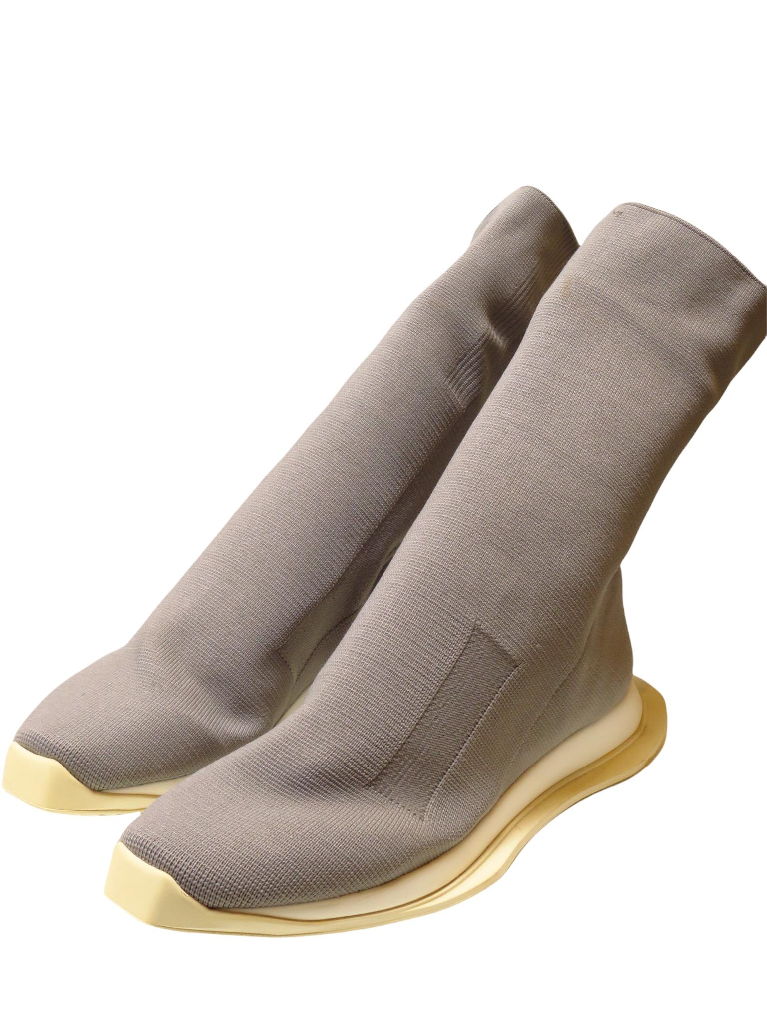 Blue stretch fabric runner low sock boots from Rick Owens DRKSHDW featuring a milk white athletic rubber sole, square toe and snug sock-like fit.