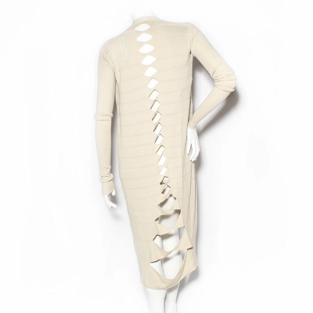 Rick Owens Duster Cardigan 
Made in Italy 
Champagne color 
100% cotton 
Ribbed knit 
Longer length rib knit sleeves 
Diamond cut-outs down back of cardigan 
Diamond cut-outs graduate in size down back from small to large
Excellent condition;