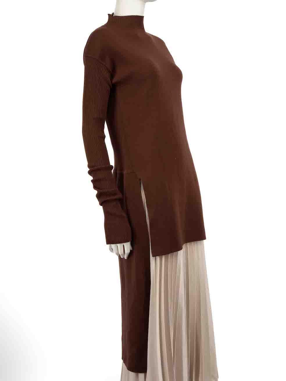 CONDITION is Very good. Hardly any visible wear to dress is evident on this used Rick Owens designer resale item.
 
 
 
 Details
 
 
 F/W 2014
 
 Brown
 
 Wool
 
 Long sleeves top
 
 Knitted and stretchy
 
 High low hemline
 
 Mock neckline
 
 Slits