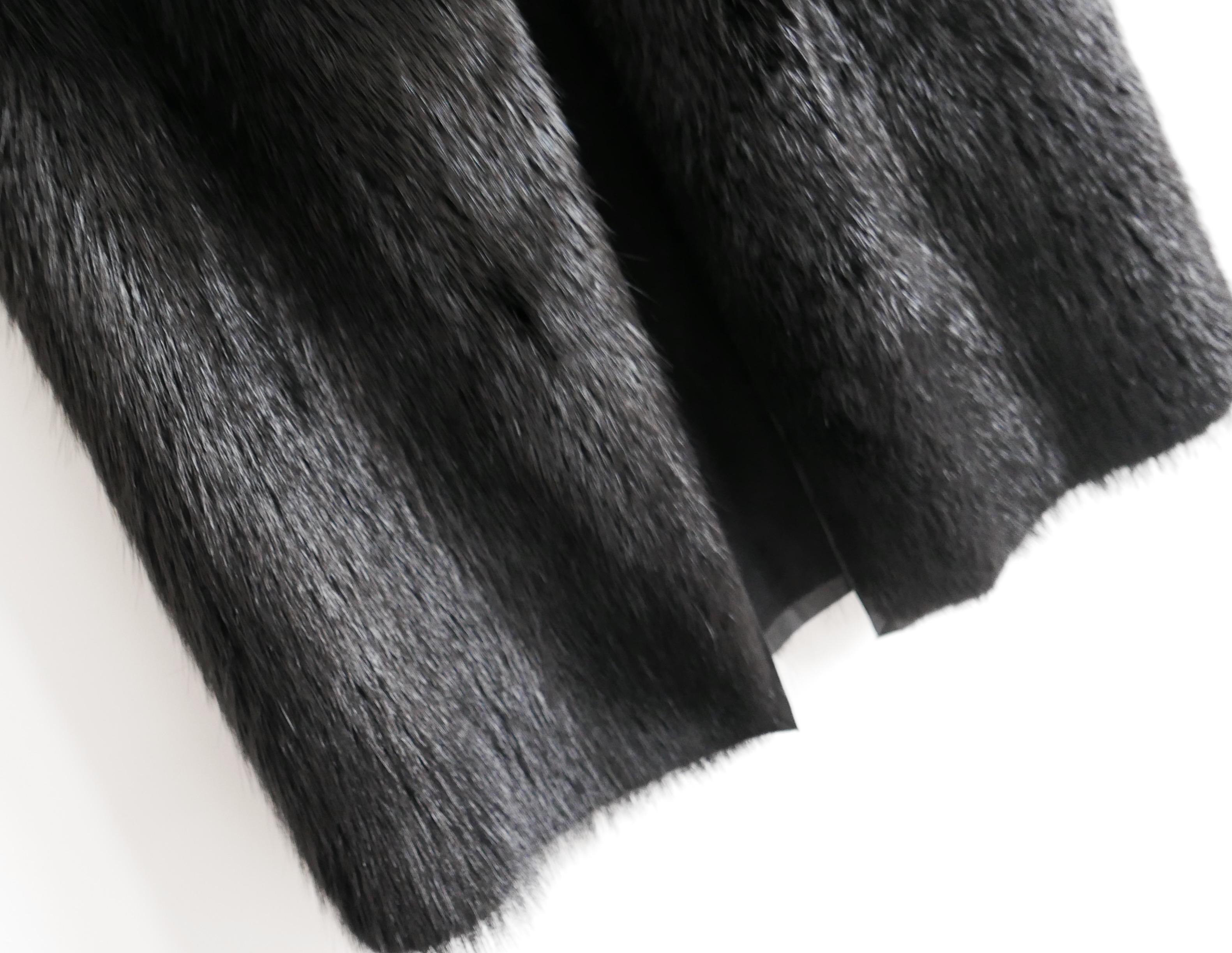 UK shipping only! 

The most amazing Rick Owens fur cape from the Fall 2011 runway - look 11 on the runway. Unisex design. Bought for £9000 and worn once. Made from super smooth, glossy black beaver fur with single hook to fasten at neck. 

Size