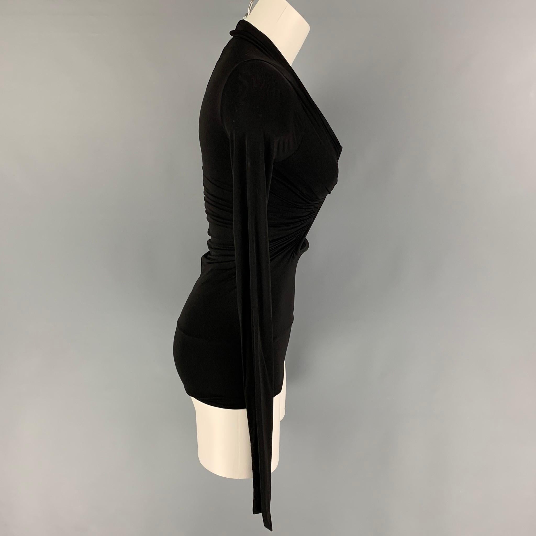 RICK OWENS FOGACHINE SS 22 blouse comes in a black stretch polyamide featuring a sculptural cut-out, long sleeves, and a ruched design.

Excellent Pre-Owned Condition.
Marked: 4
Original Retail Price: $1,065.00

Measurements:

Shoulder: 10 in.
Bust: