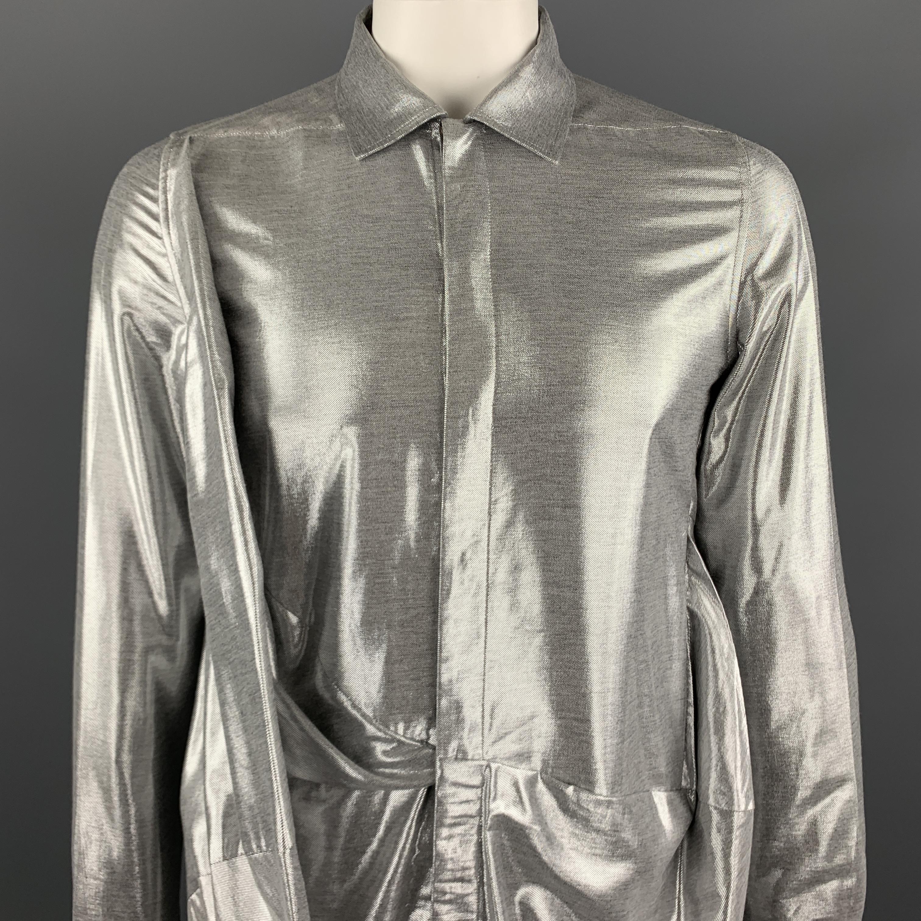 RICK OWENS F/W 19 Long Sleeve Shirt comes in a silver metallic viscose blend material, with a classic collar, hidden buttons at closure, a draped front, a bubble asymmetrical hem, and buttoned cuffs. Made in Italy.

New with Tags.
Marked: US