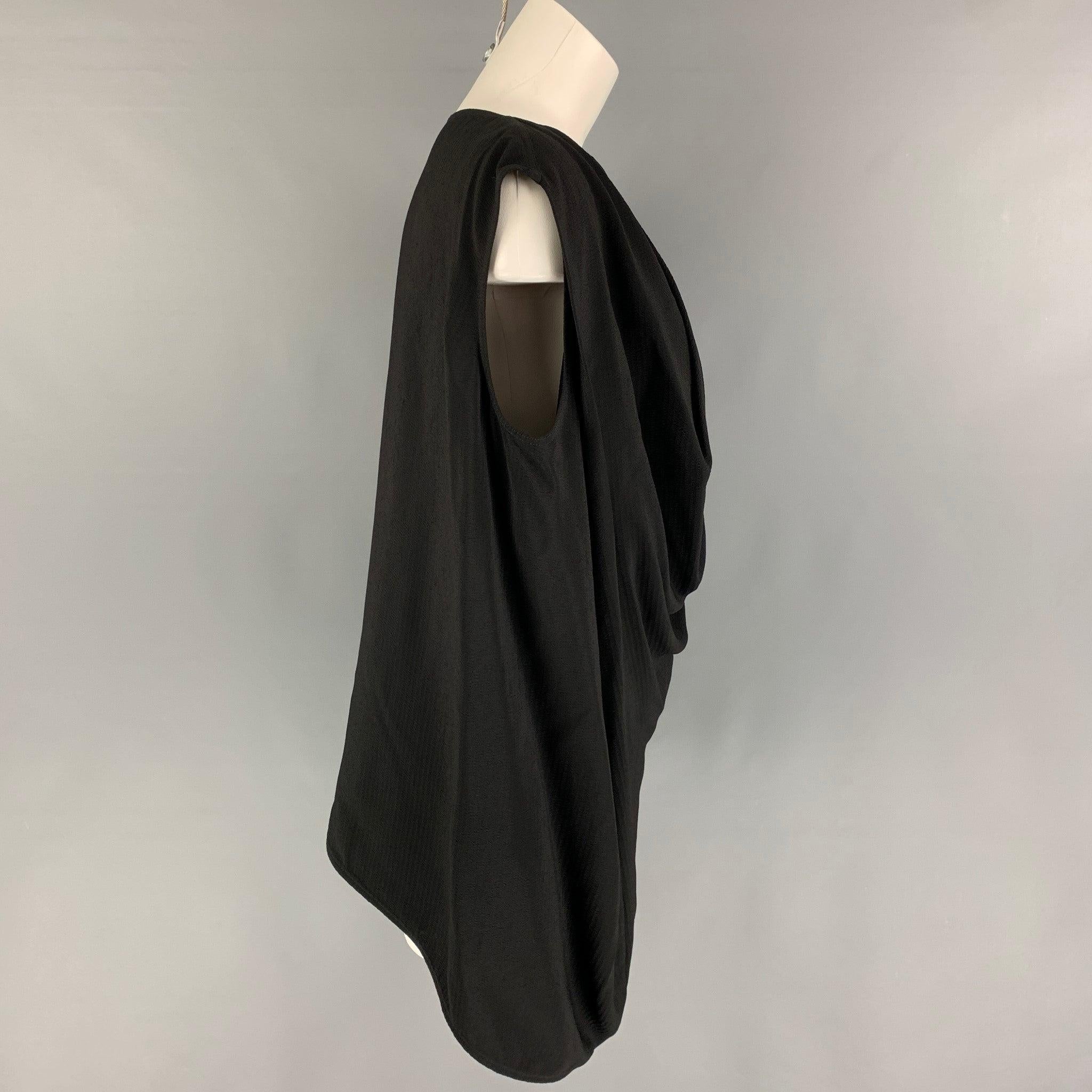 RICK OWENS 'GLITTER FW 17' blouse comes in a black viscose featuring a draped style, sleeveless, and a
 asymmetrical hem.
Very Good
Pre-Owned Condition. 

Marked:   8 

Measurements: 
 
Shoulder: 17.5 inches  Bust: 42 inches  Length: 26 inches 
  
 