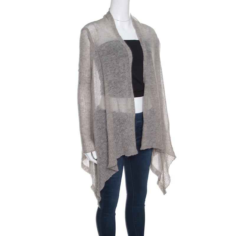 Be fashionably warm in this Water Fall cardigan by Rick Owens. The grey coloured cardigan can be worn over jeans for a chic look. It features an open front design and long sleeves. Pairing it up with a contrasting woollen muffler or scarf will fetch